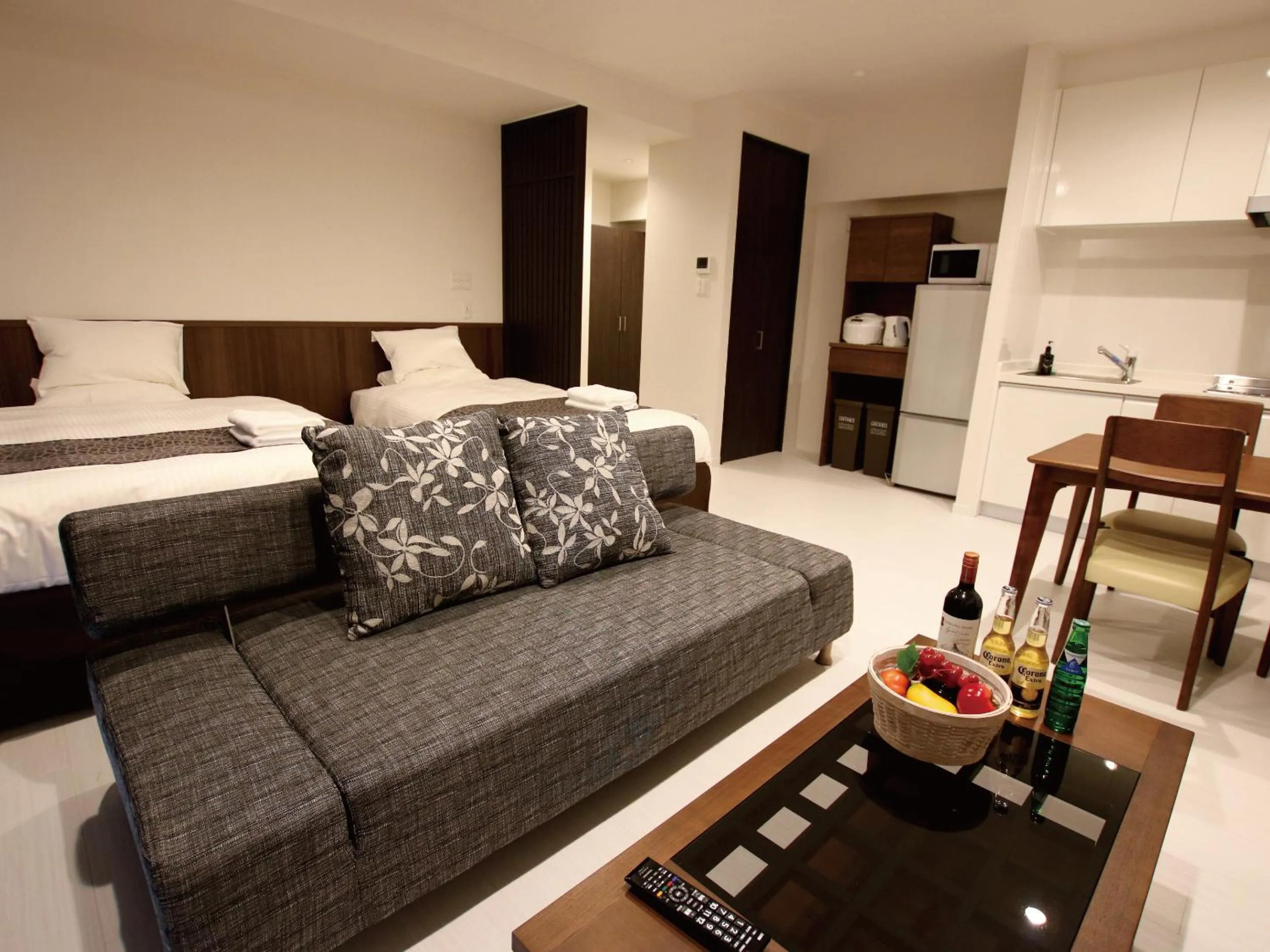 Living room, Bed in Sunset Resort Mihama -SEVEN Hotels and Resorts-
