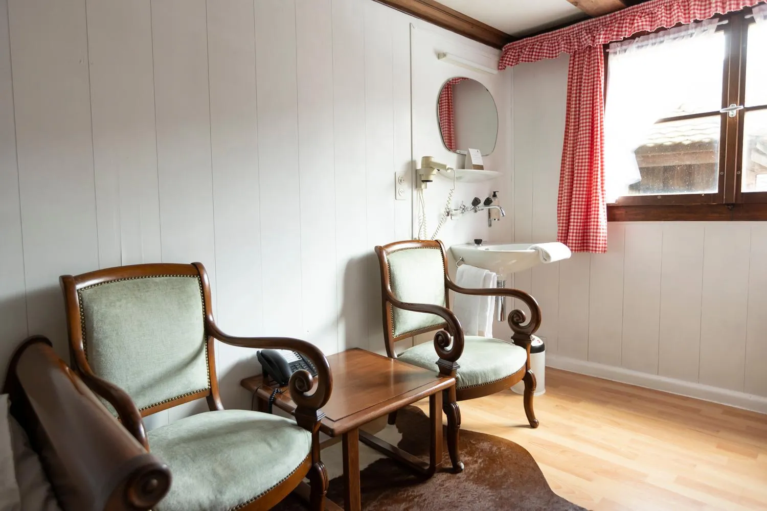 Seating area in Swiss-Chalet Merlischachen - Historik Chalet-Hotel Lodge