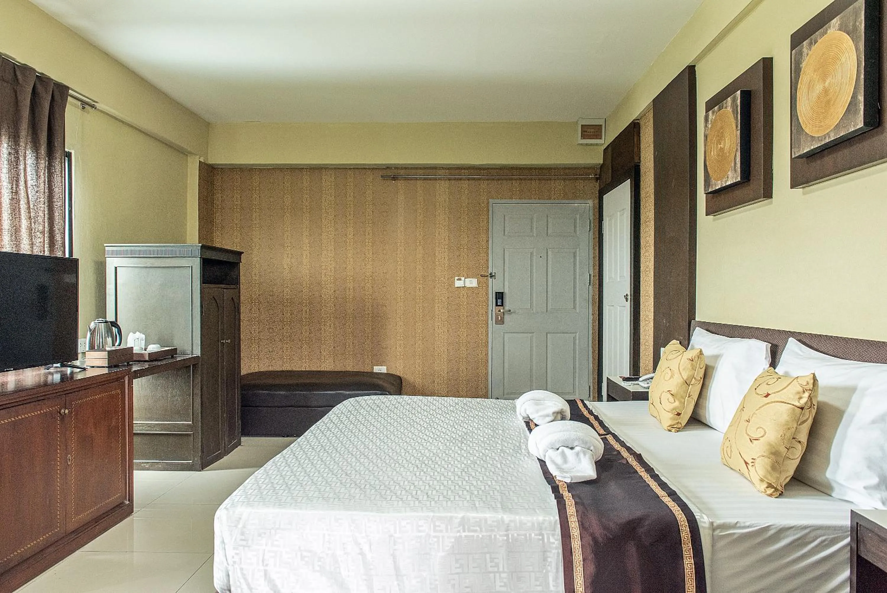 Bed in The Wing Design Hotel