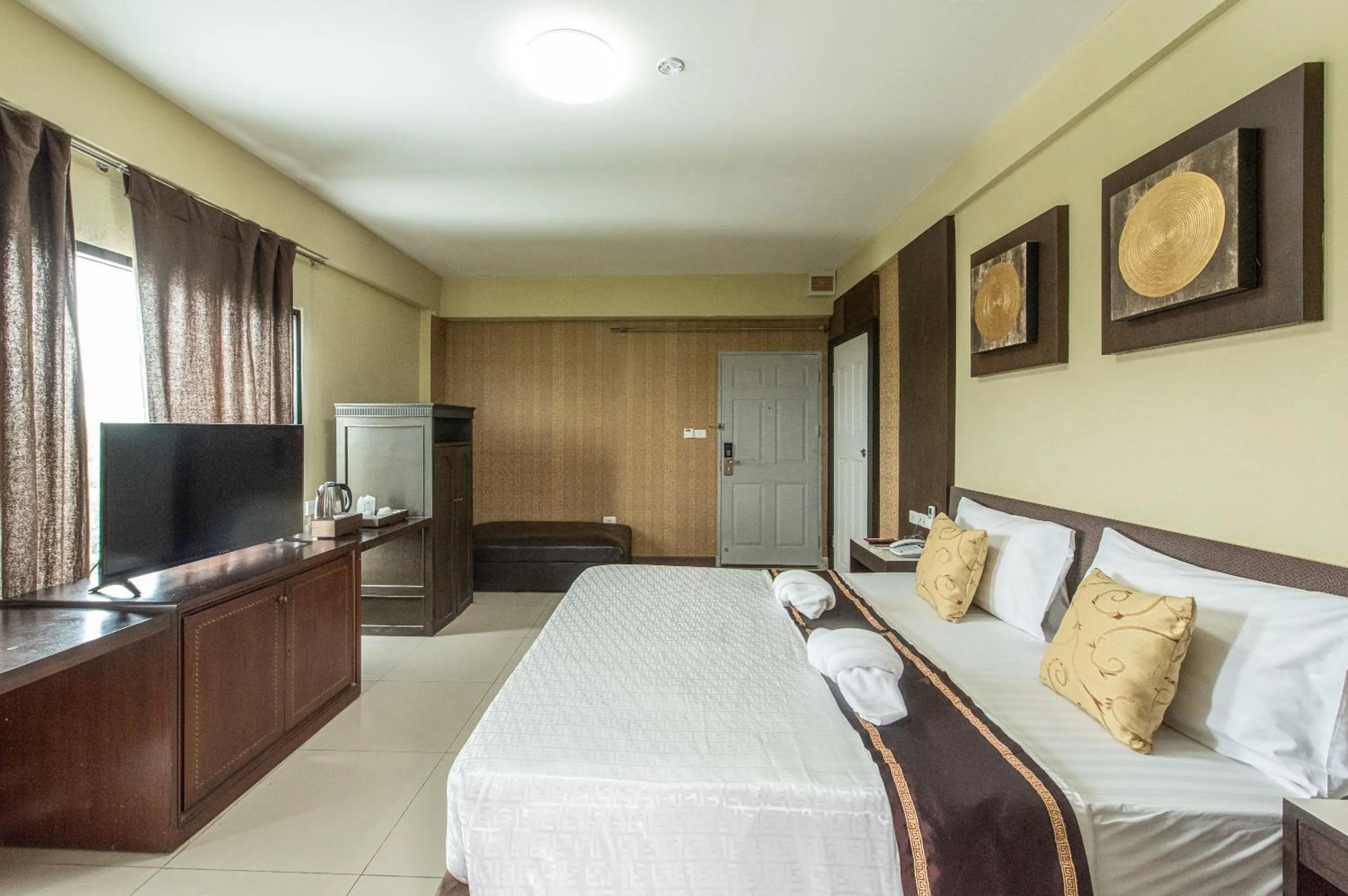 Bed in The Wing Design Hotel