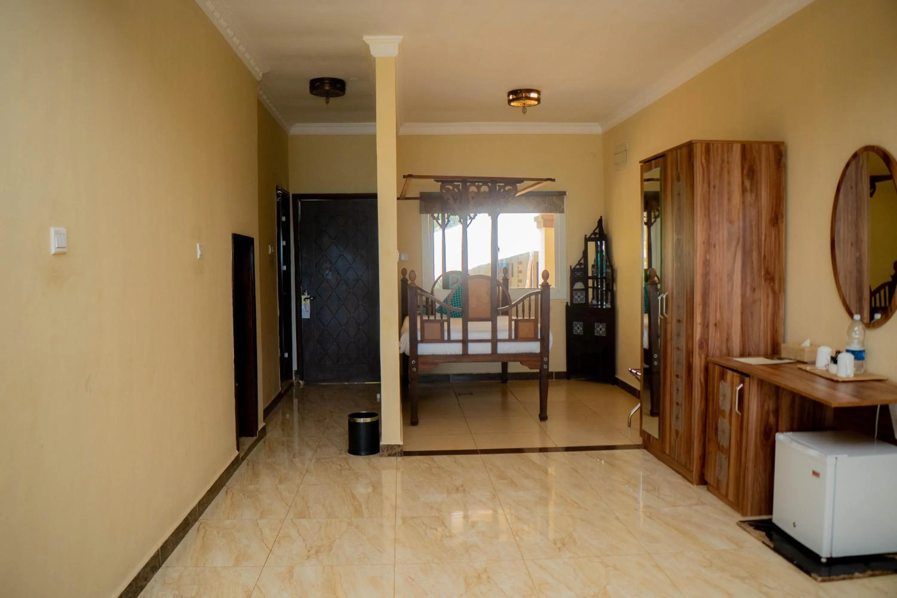 Bed in Golden Palm Boutique Zanzibar