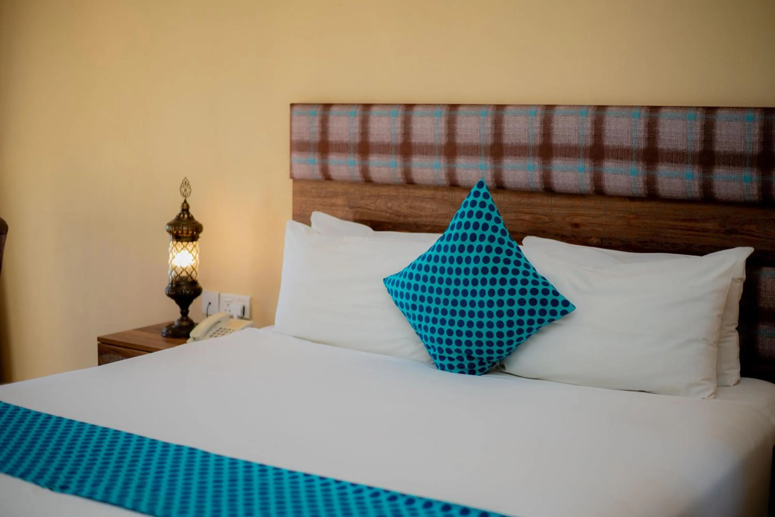 Bed in Golden Palm Boutique Zanzibar