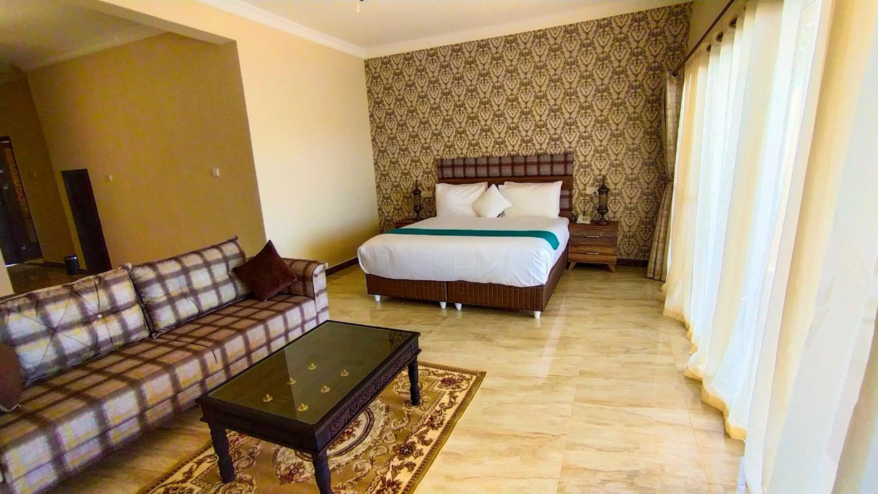 Bed in Golden Palm Boutique Zanzibar