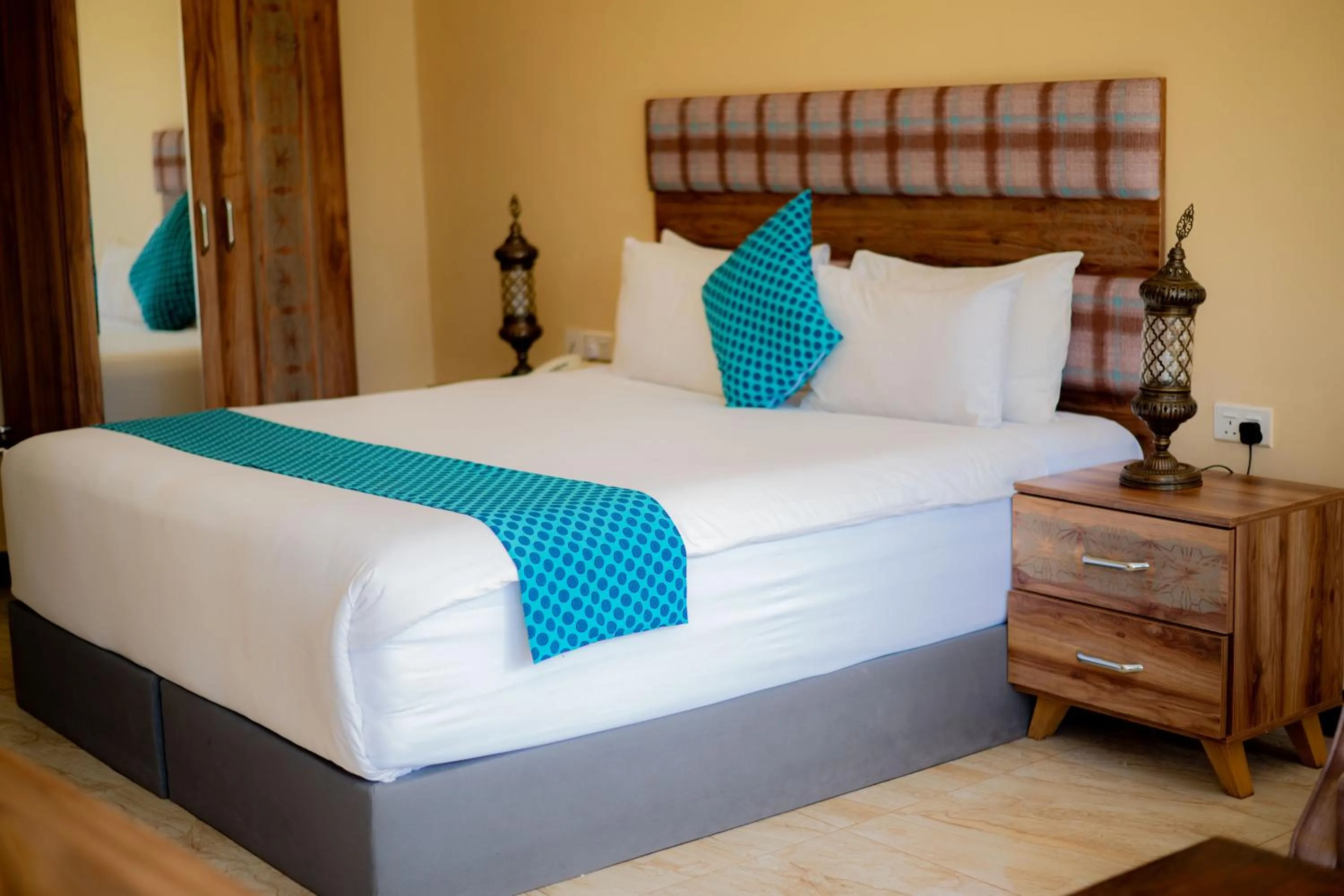 Bed in Golden Palm Boutique Zanzibar