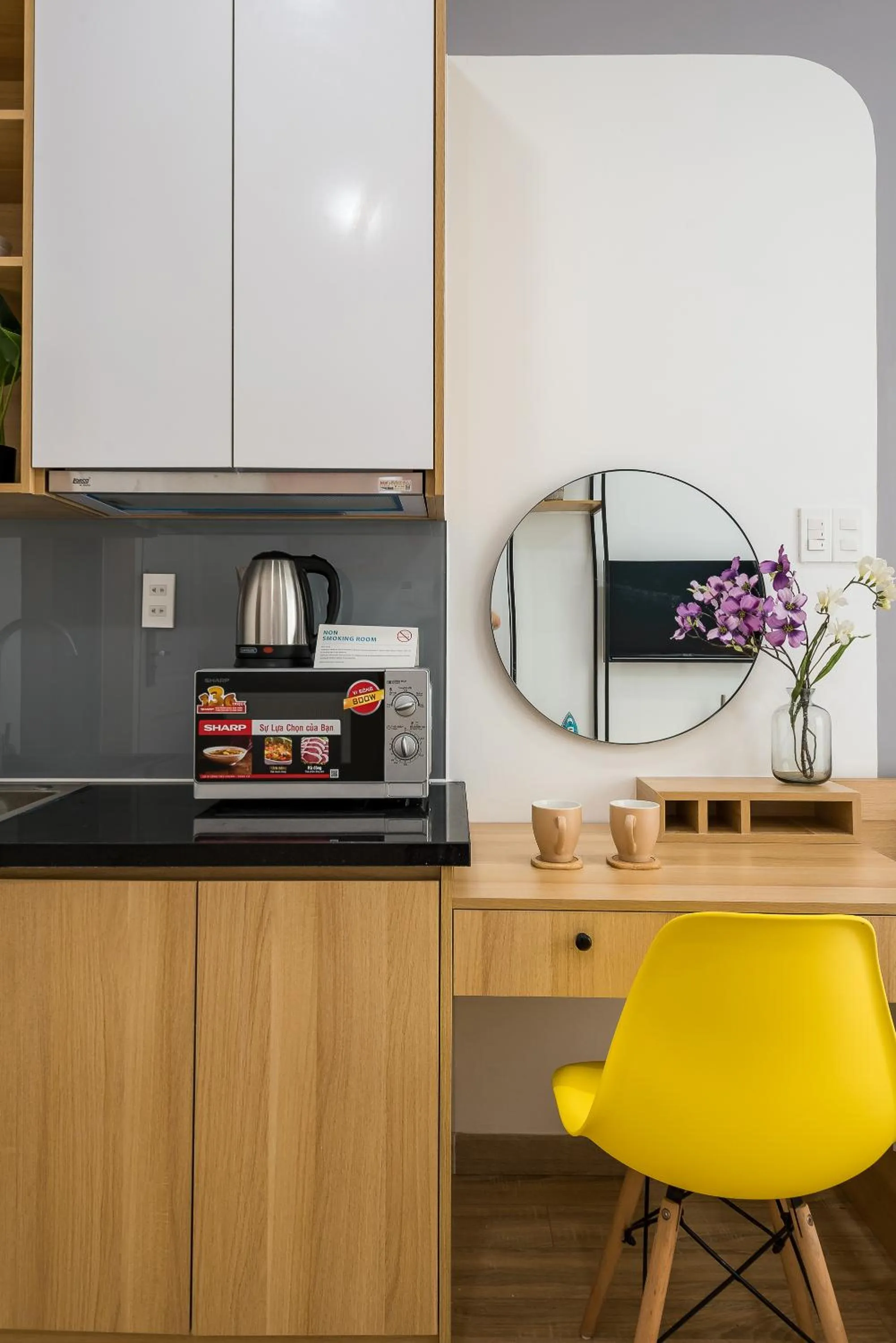 Communal kitchen in Cozrum Homes Ambera House