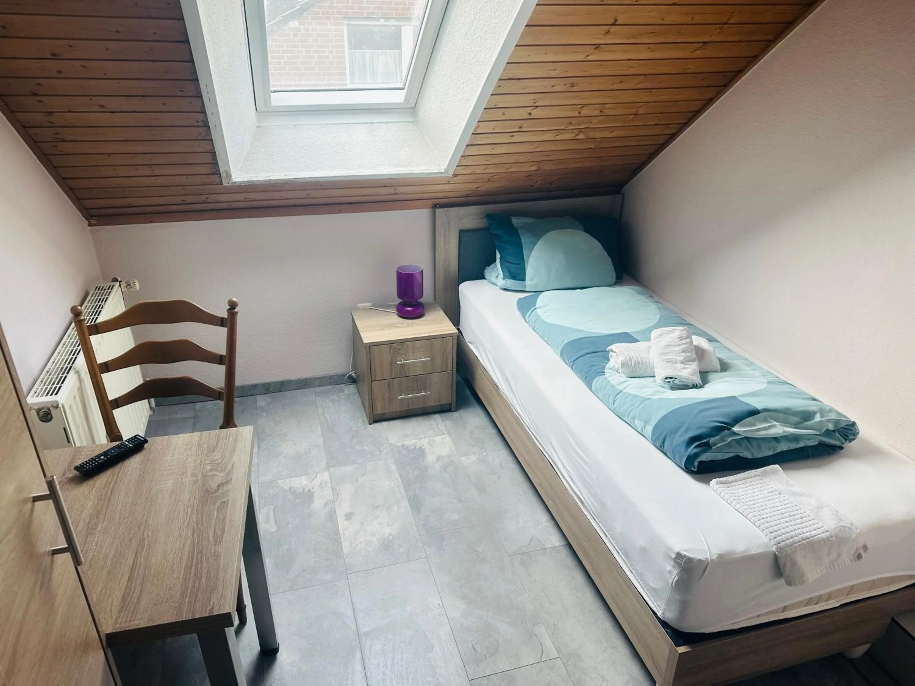 Bed in Hotel-Restaurant Olympia