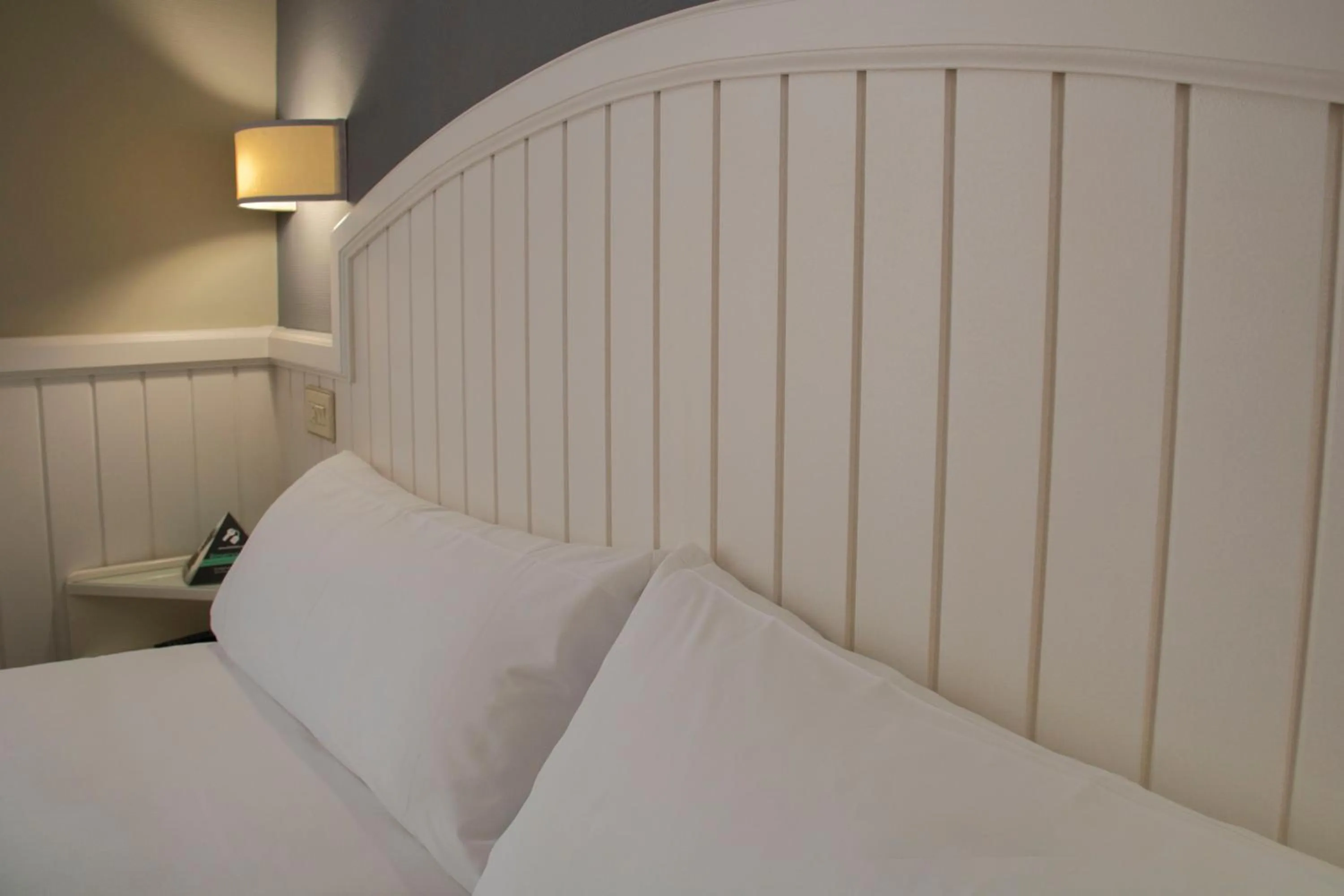 Bed in Alda Miramar Rooms