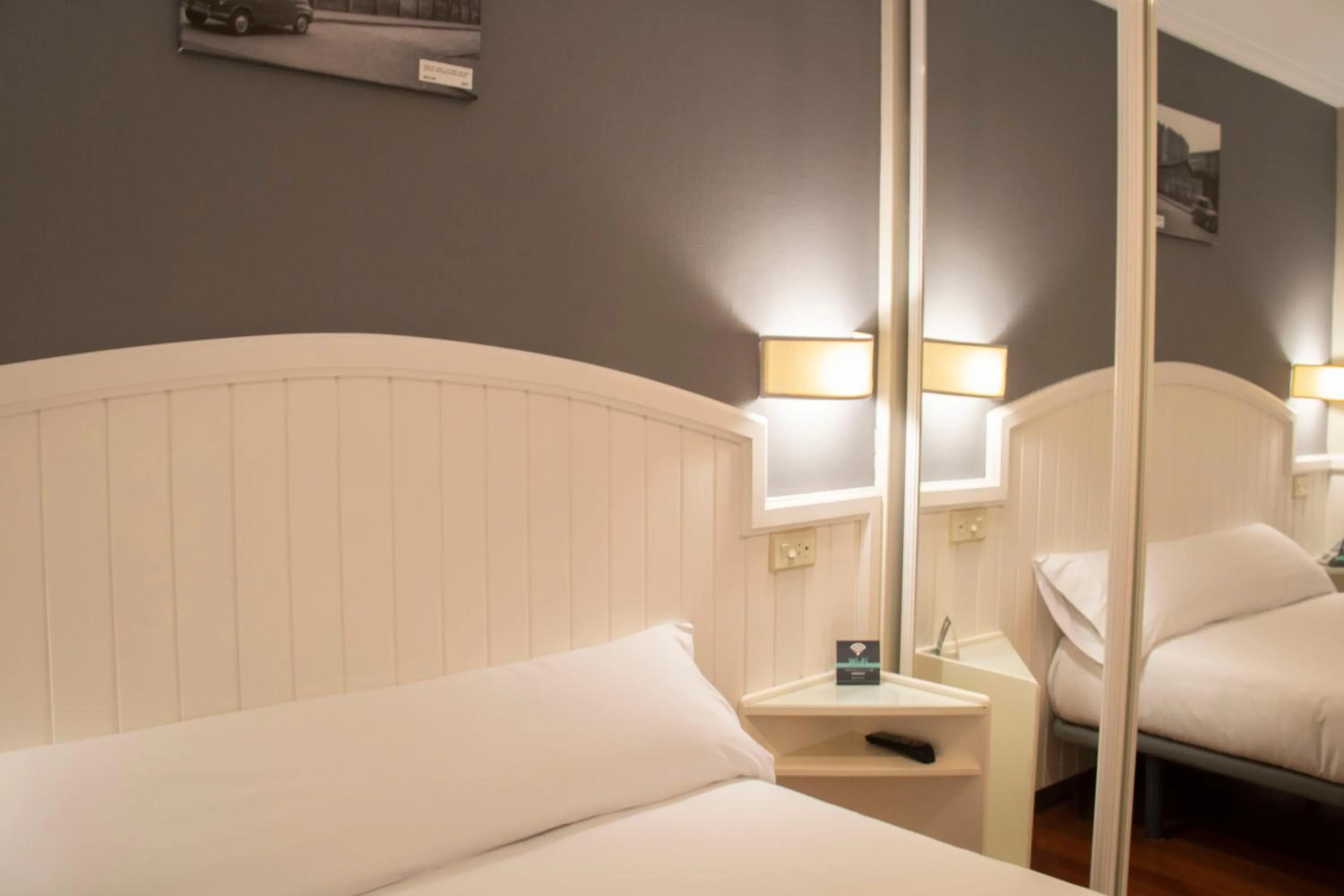 Bed in Alda Miramar Rooms