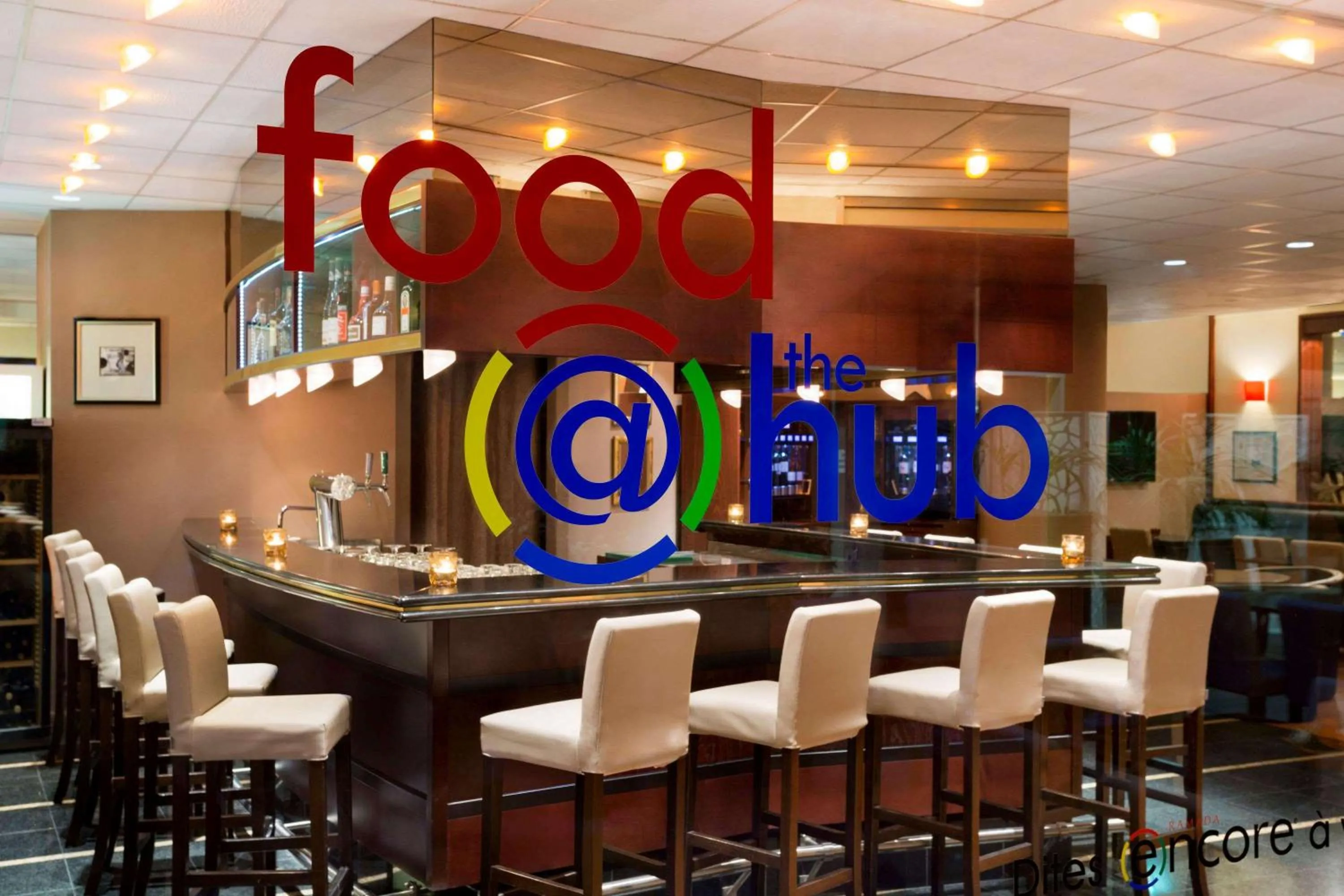 Lounge or bar in Ramada Encore by Wyndham Geneva