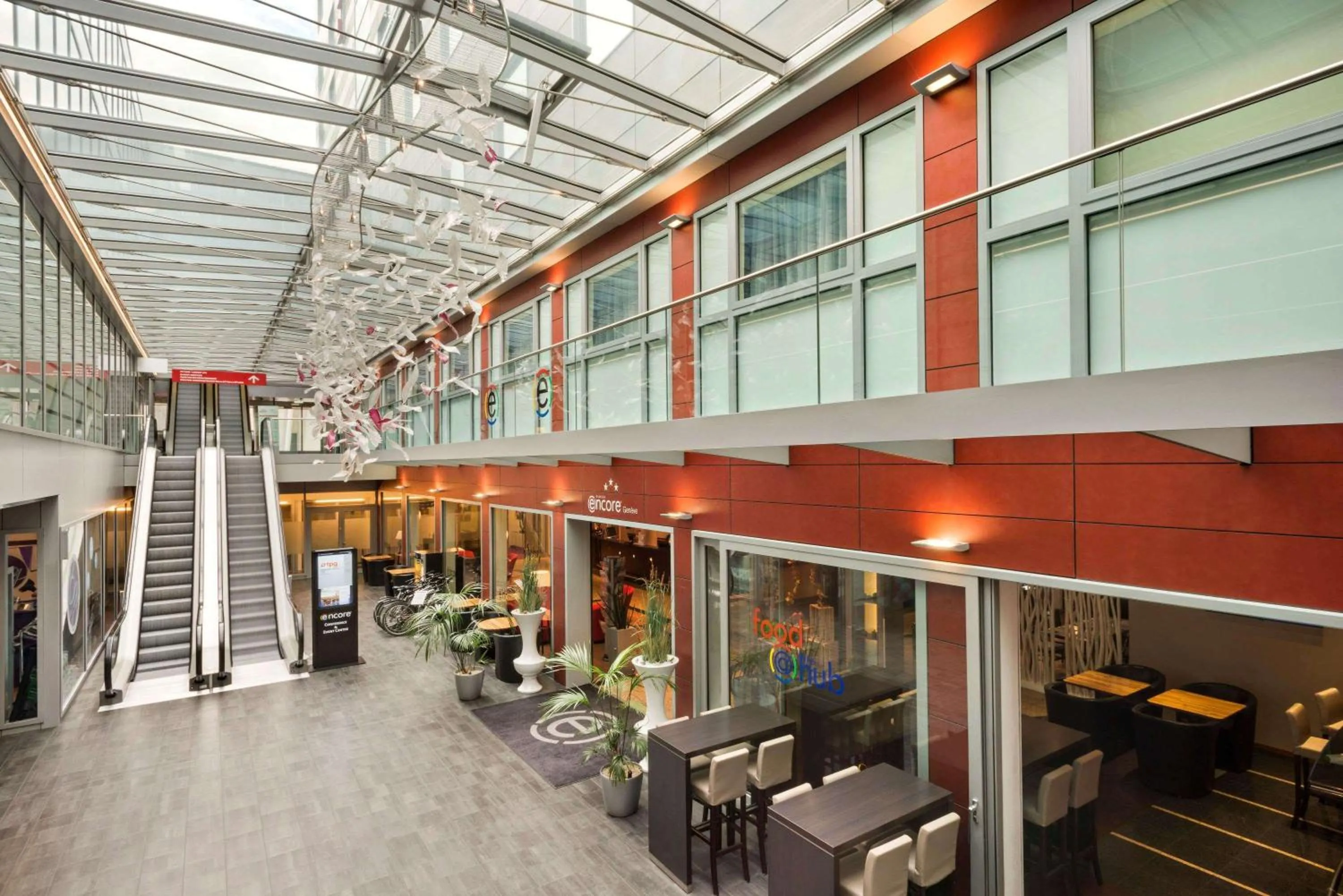 Lounge or bar in Ramada Encore by Wyndham Geneva