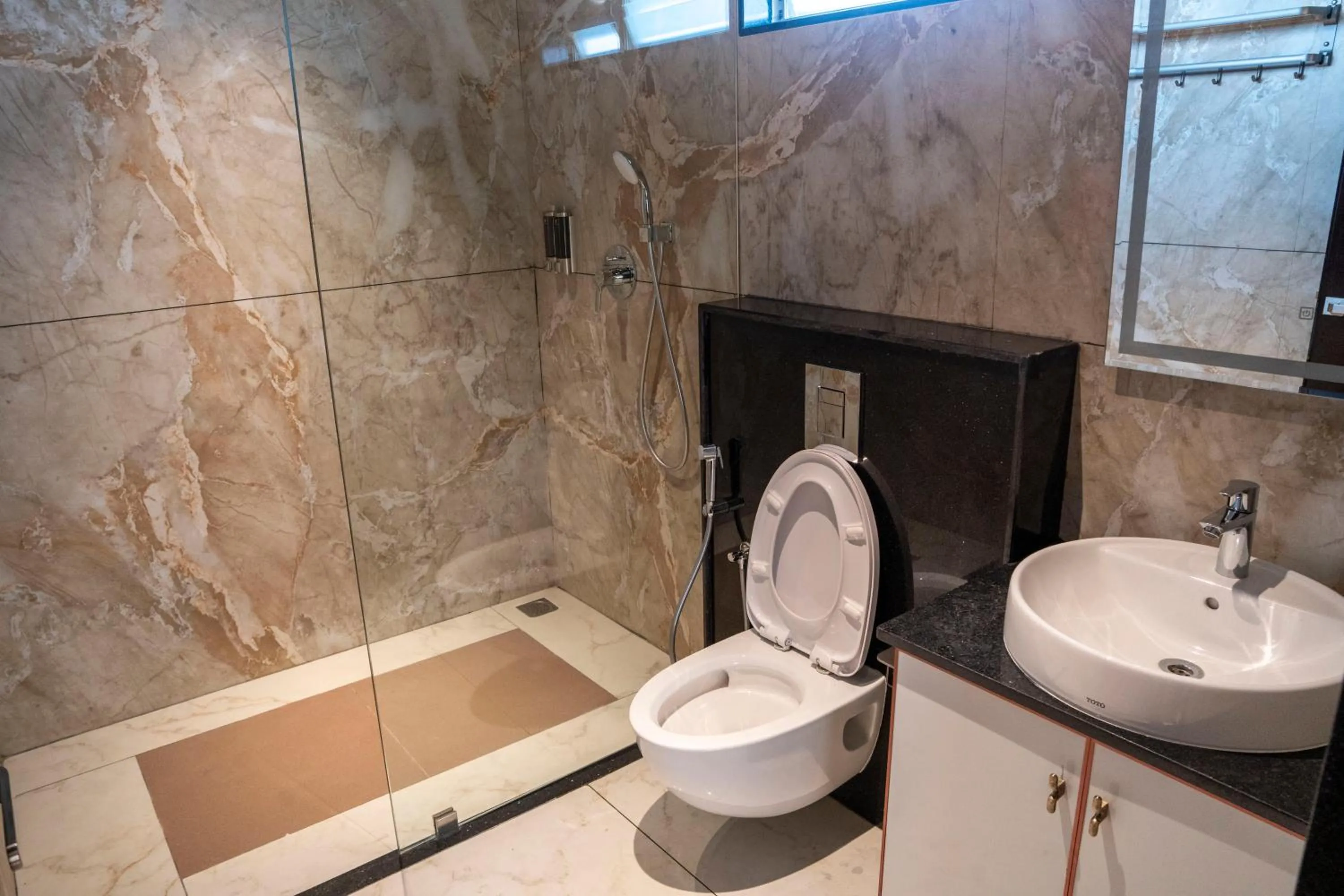 Shower in Hotel Golden Amulya Rest Wings