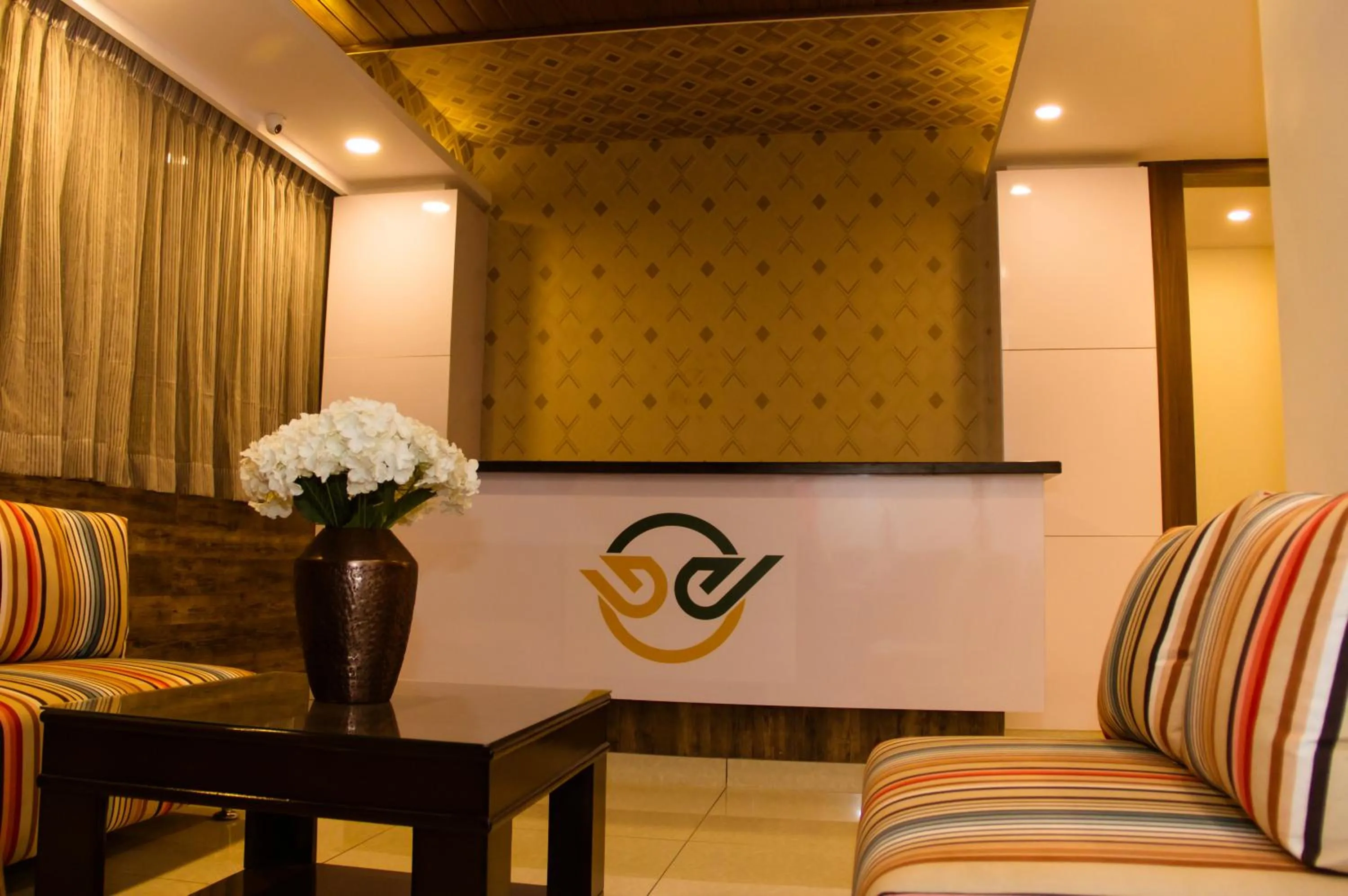 Living room in Hotel Golden Amulya Rest Wings