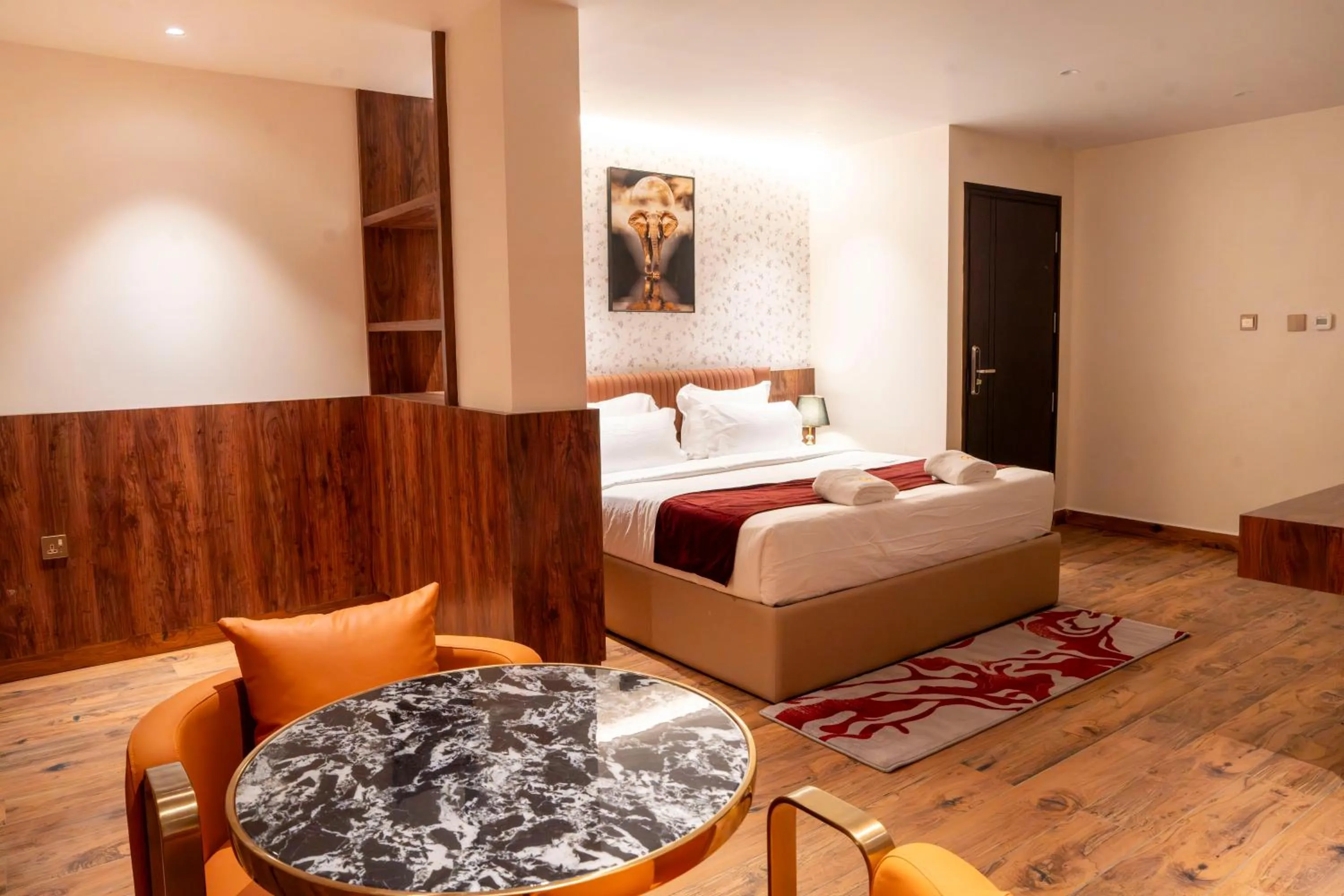 Bed in Hotel Golden Amulya Rest Wings