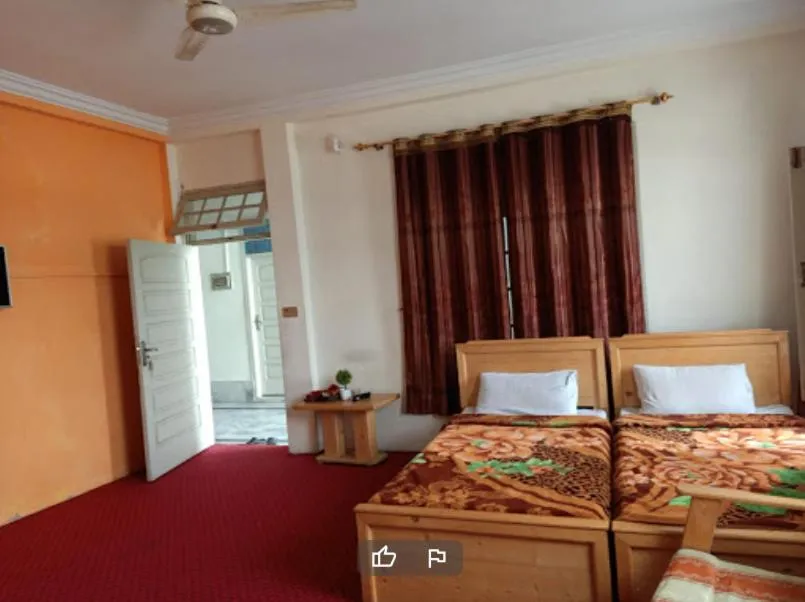 Bed in FR Darya E Swat Hotel