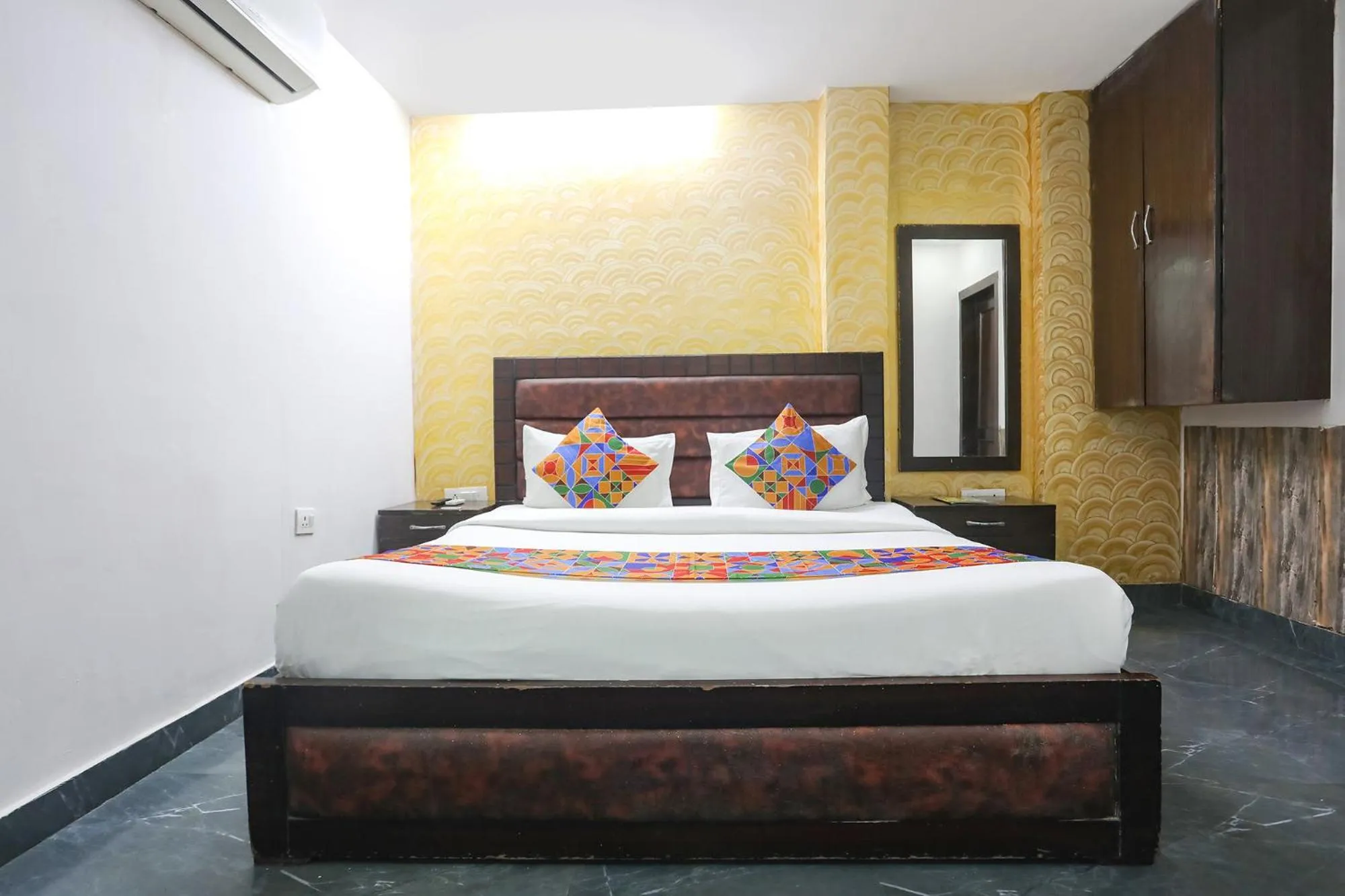 Bed in FabHotel NK Residency