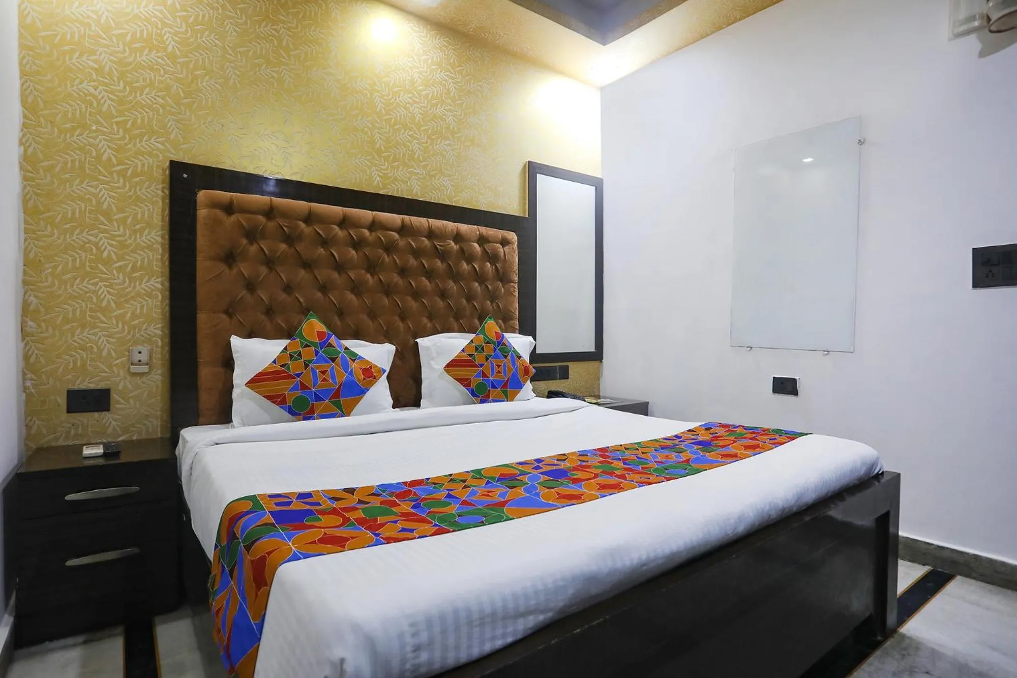 Bed in FabHotel NK Residency