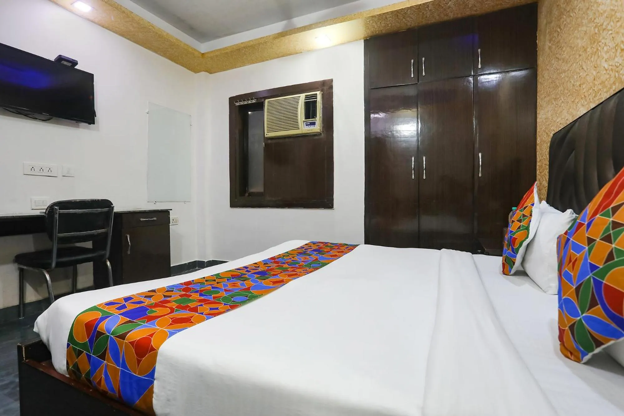 Bed in FabHotel NK Residency
