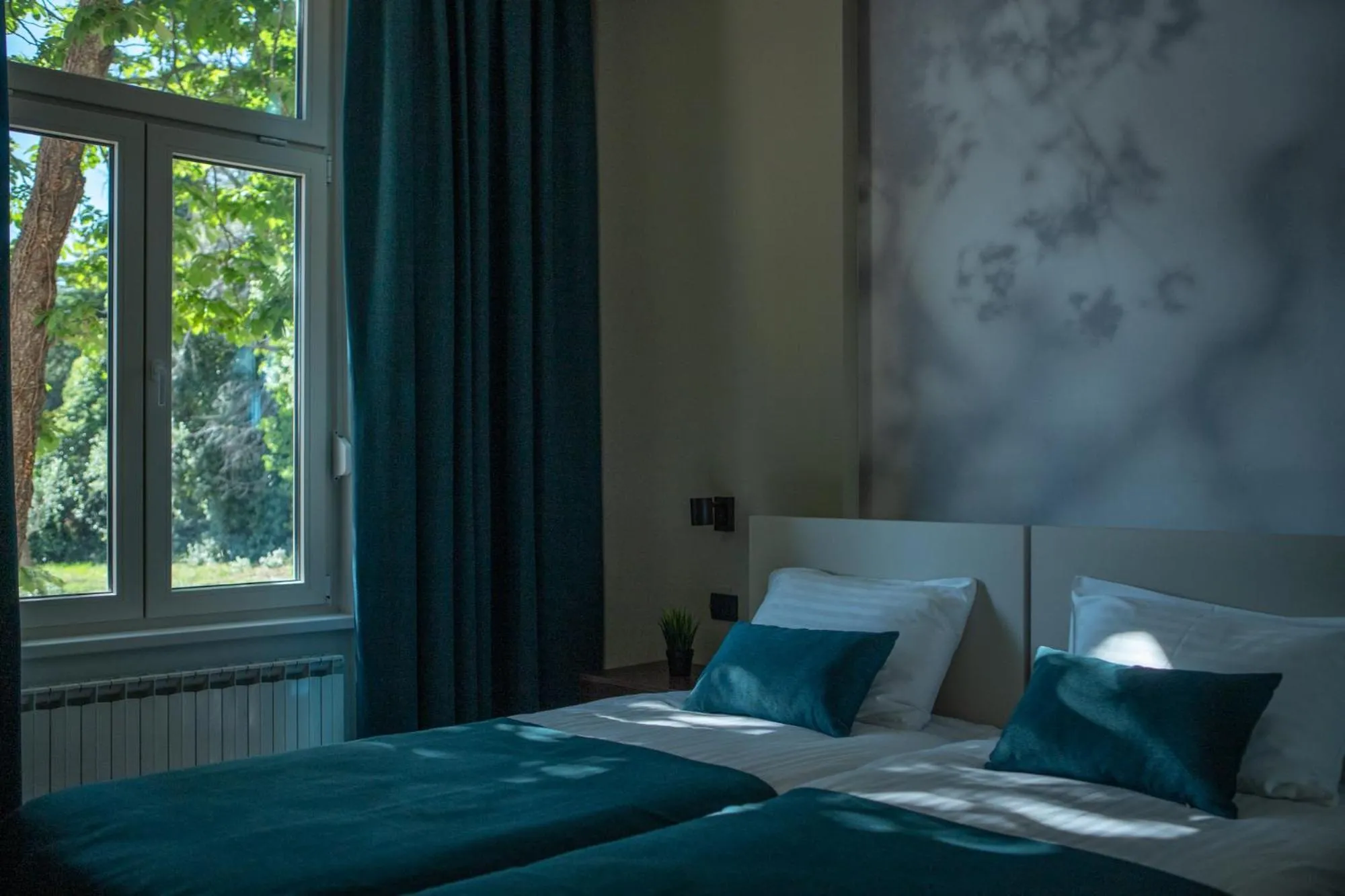 Bedroom in Villa Aurum Health & Climatotherapy Center
