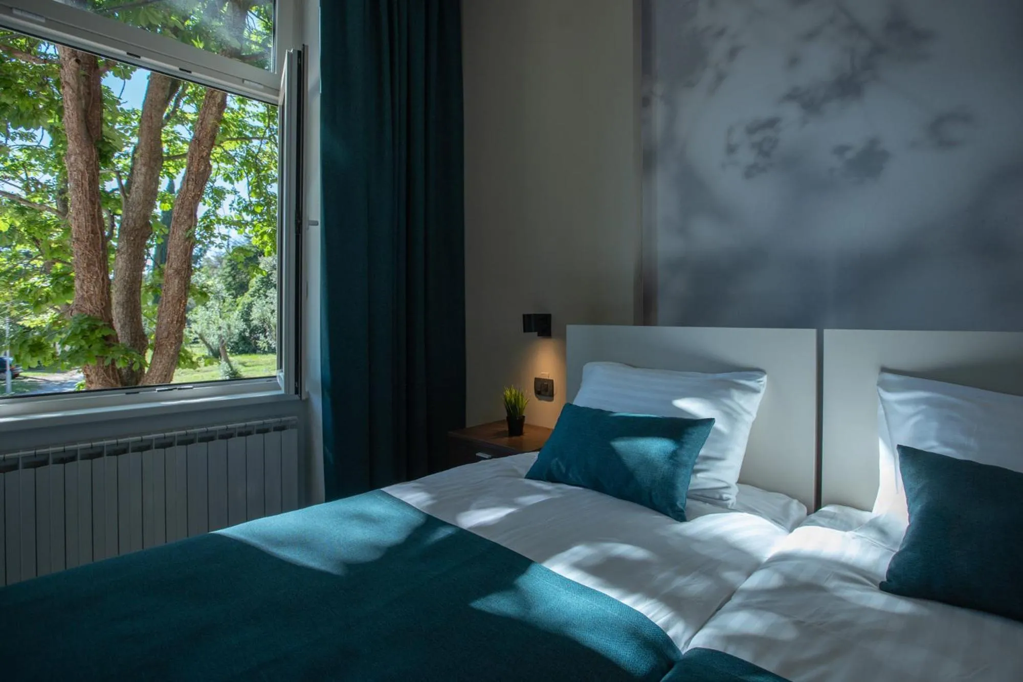 Bedroom in Villa Aurum Health & Climatotherapy Center