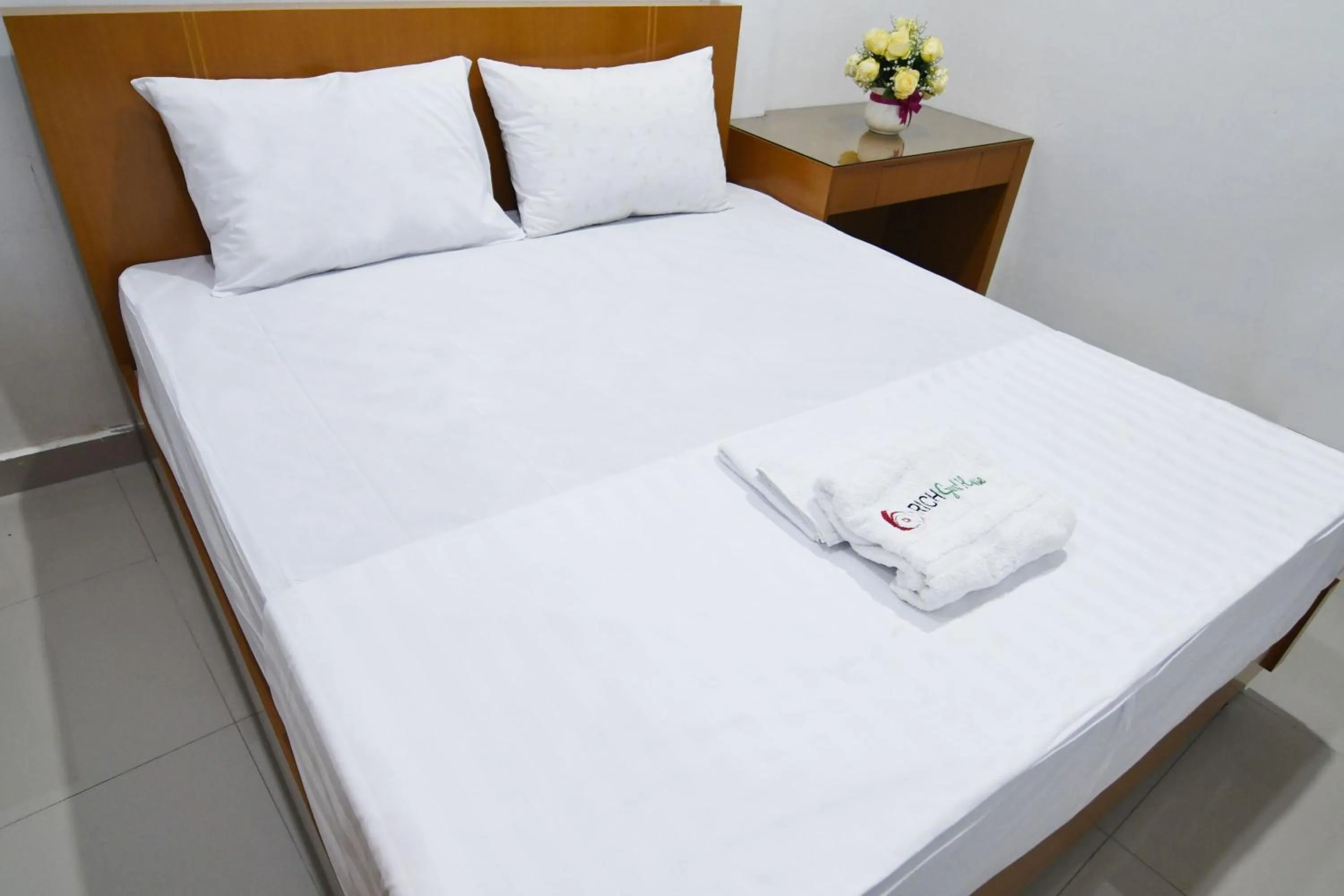 Bed in Rich Guesthouse