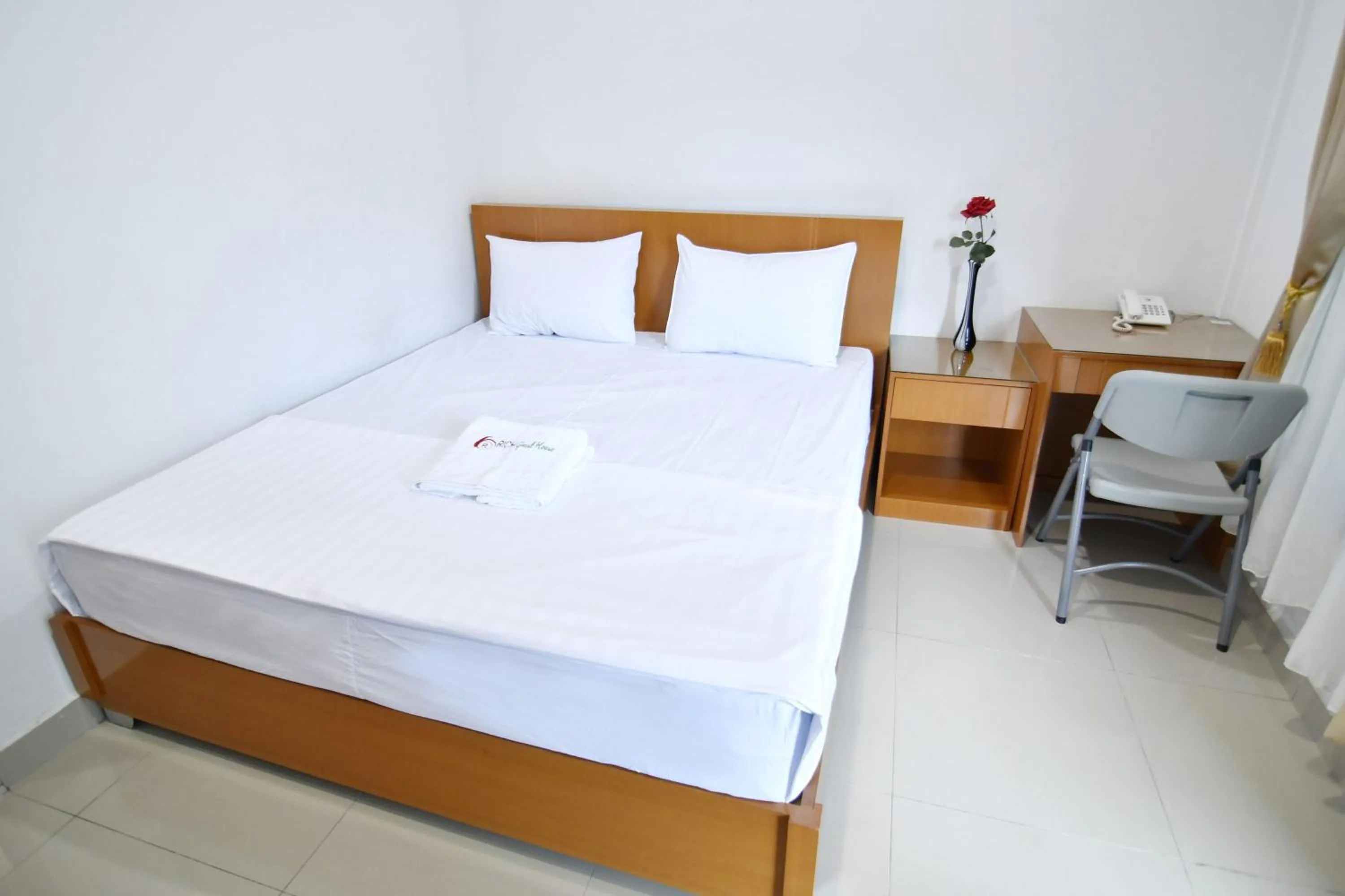 Bed in Rich Guesthouse