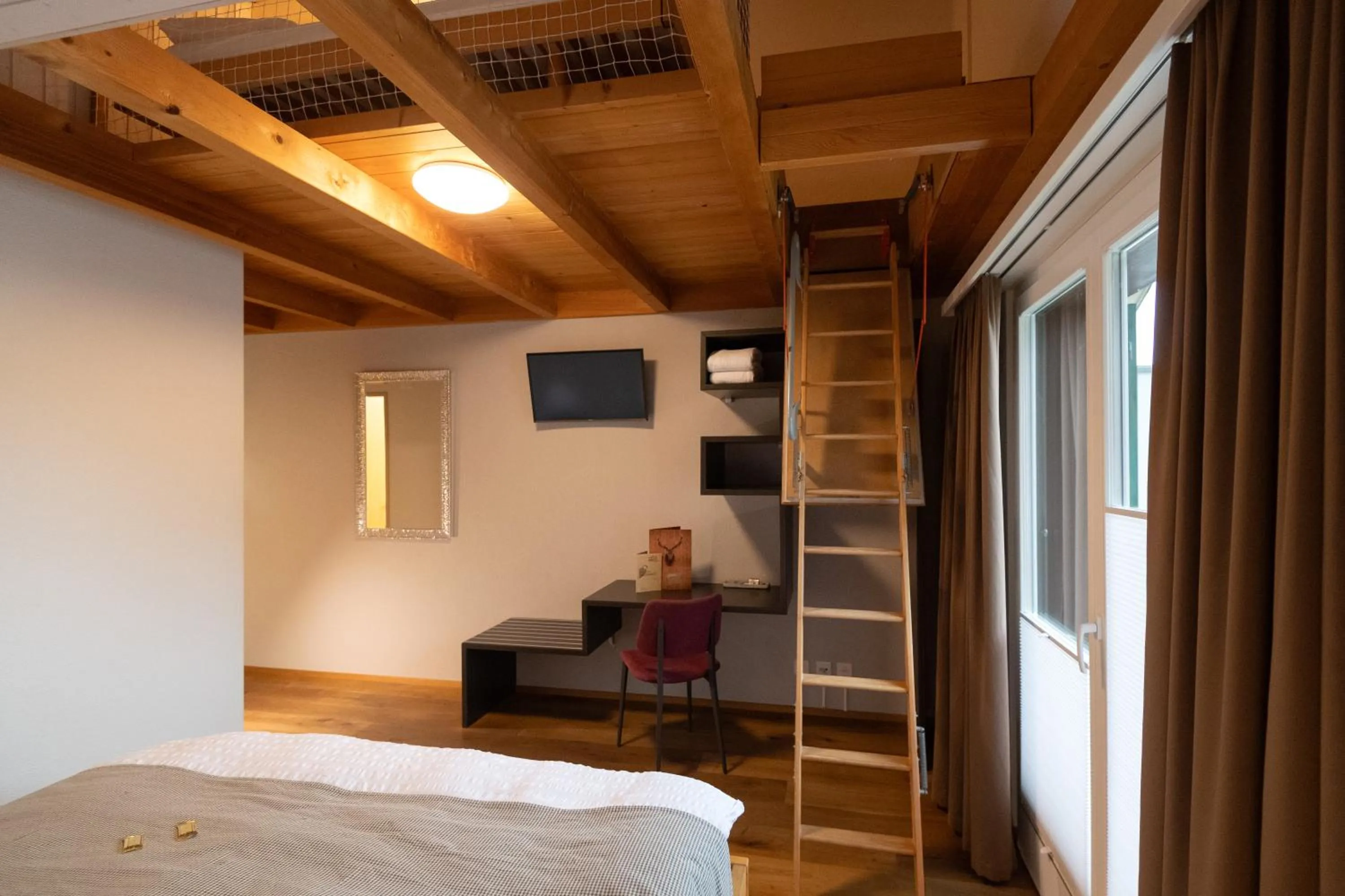 Photo of the whole room, Bed in Hotel Roggerli