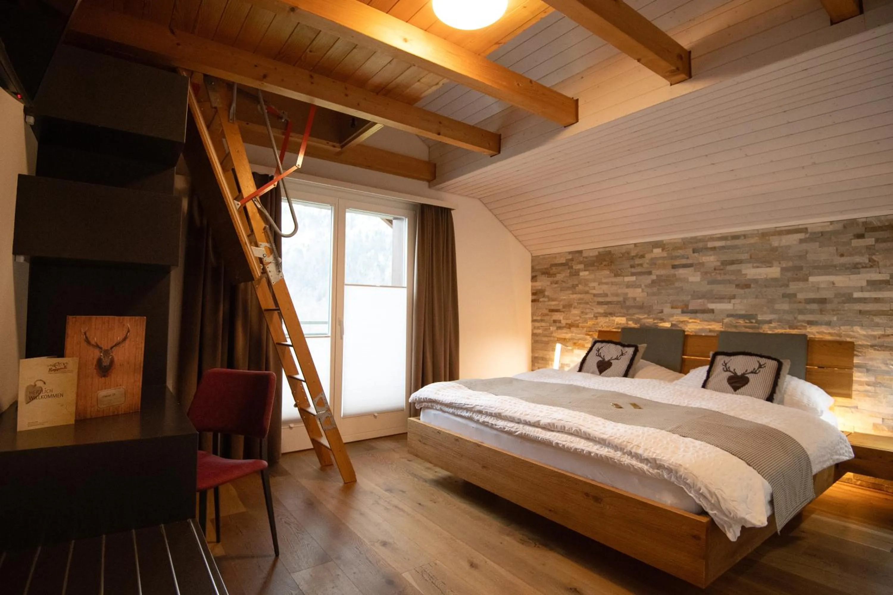 Photo of the whole room, Bed in Hotel Roggerli