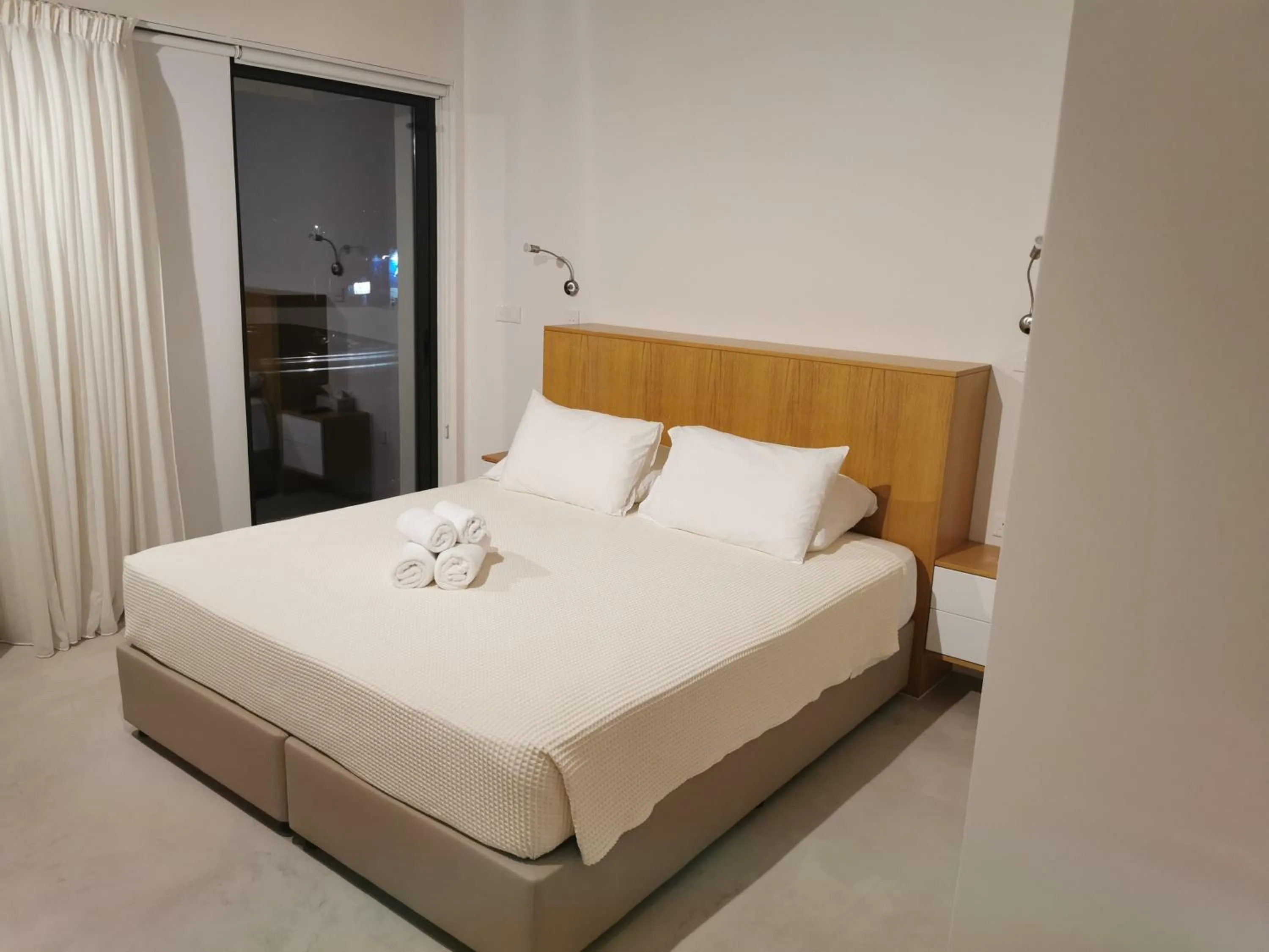 Bed in Y & P LATCHI HOTEL