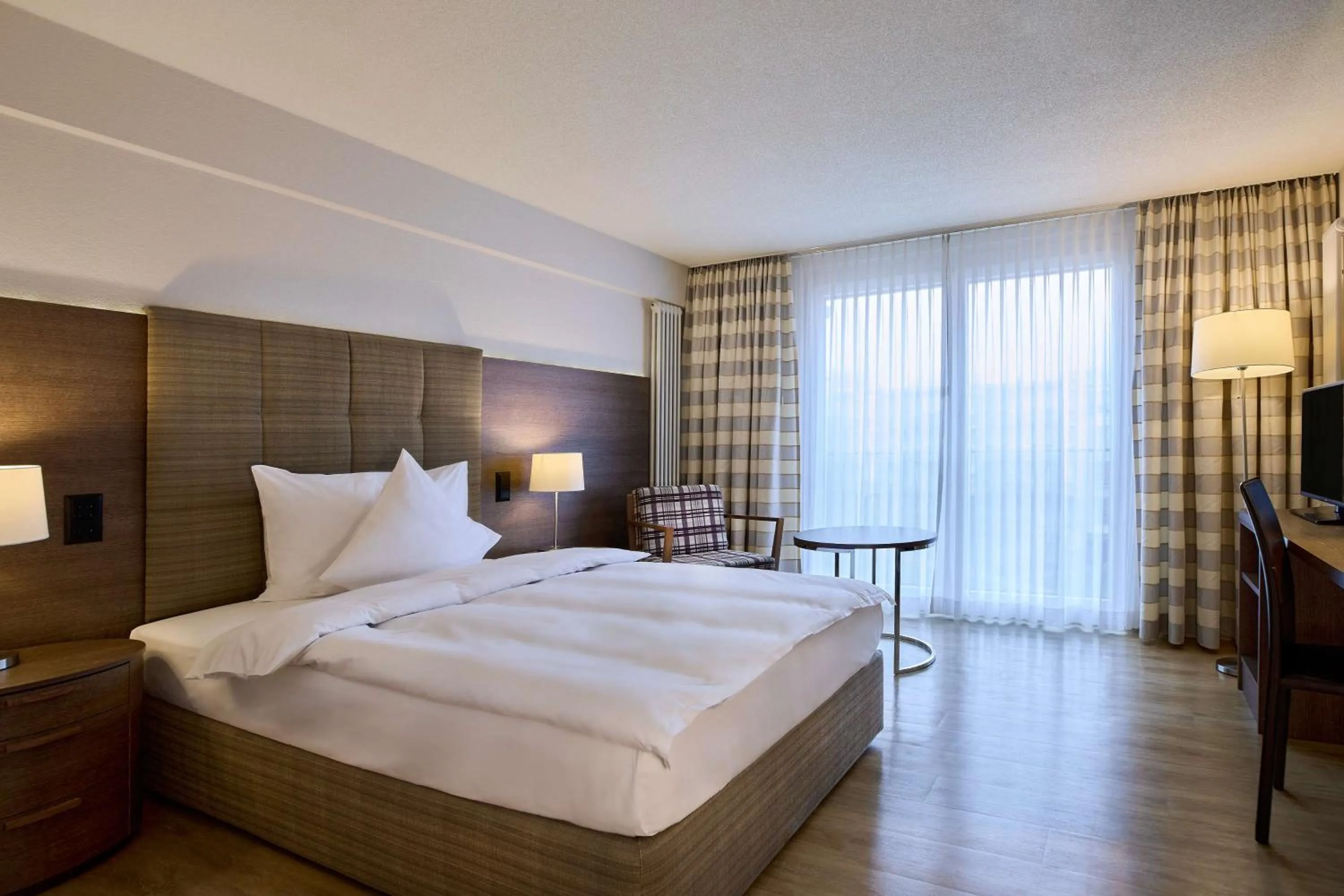 Bedroom, Bed in Dorint Parkhotel Bad Zurzach