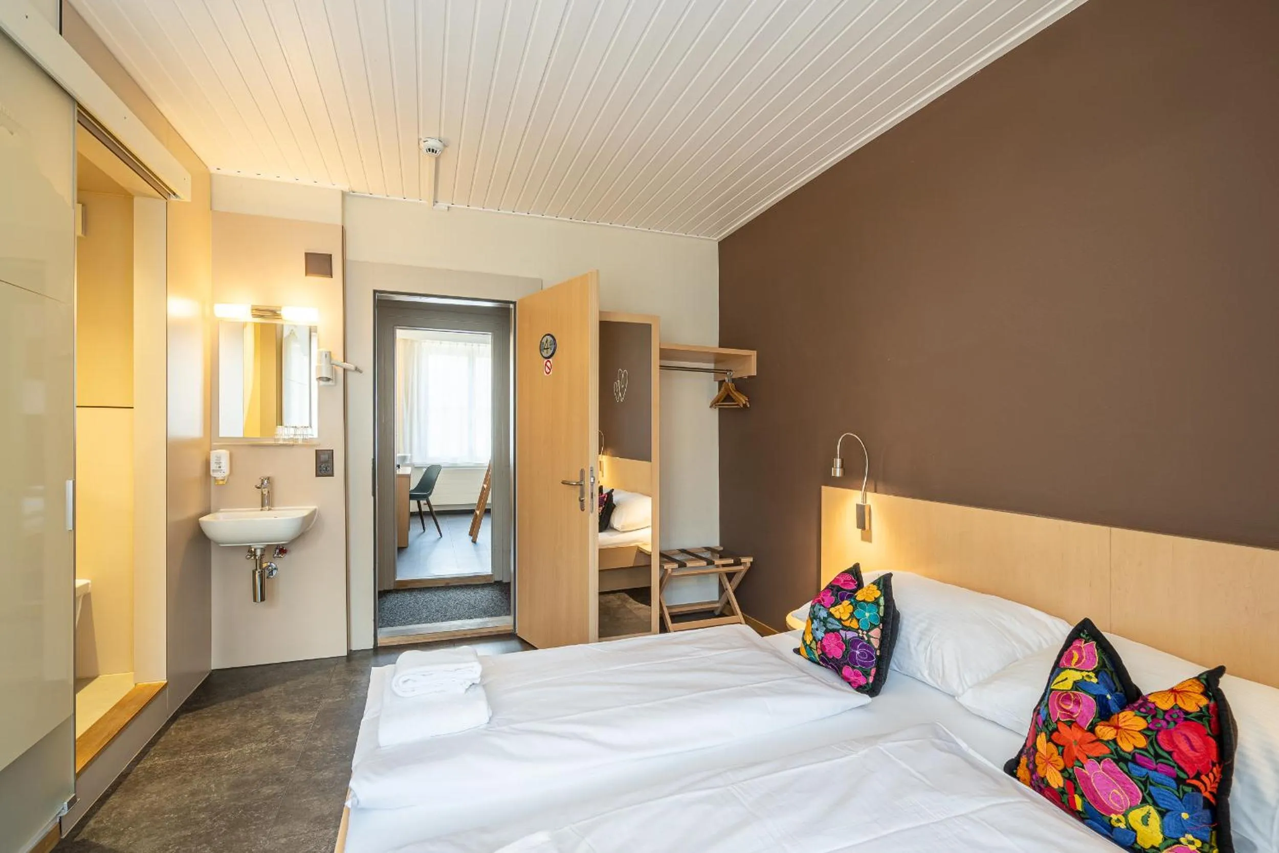 Bed in Hotel Blume Interlaken