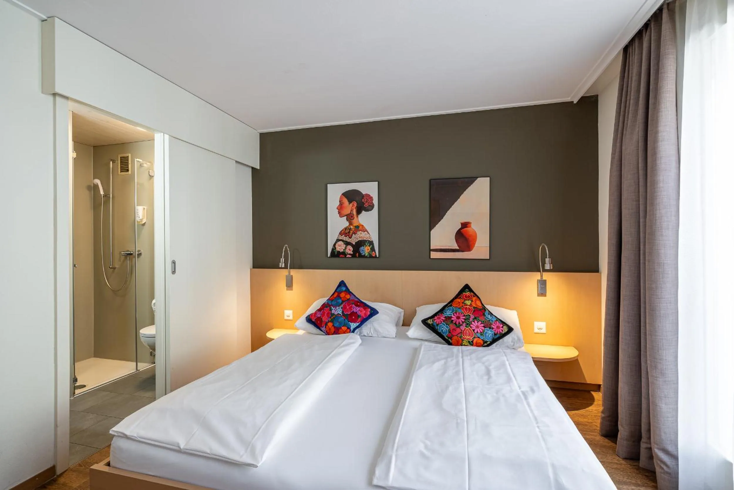 Bed in Hotel Blume Interlaken