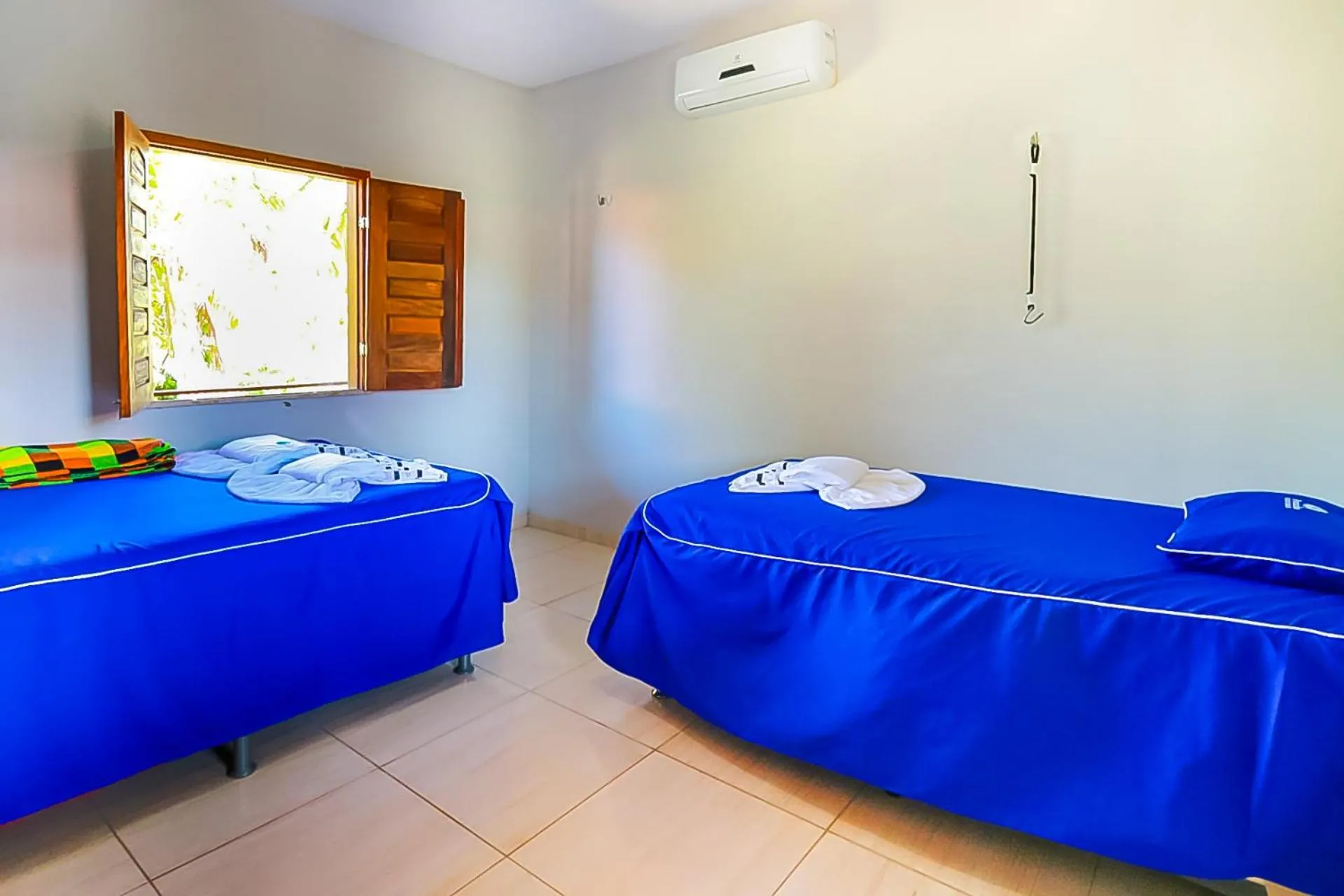 Bed in Pousada Recanto Beach