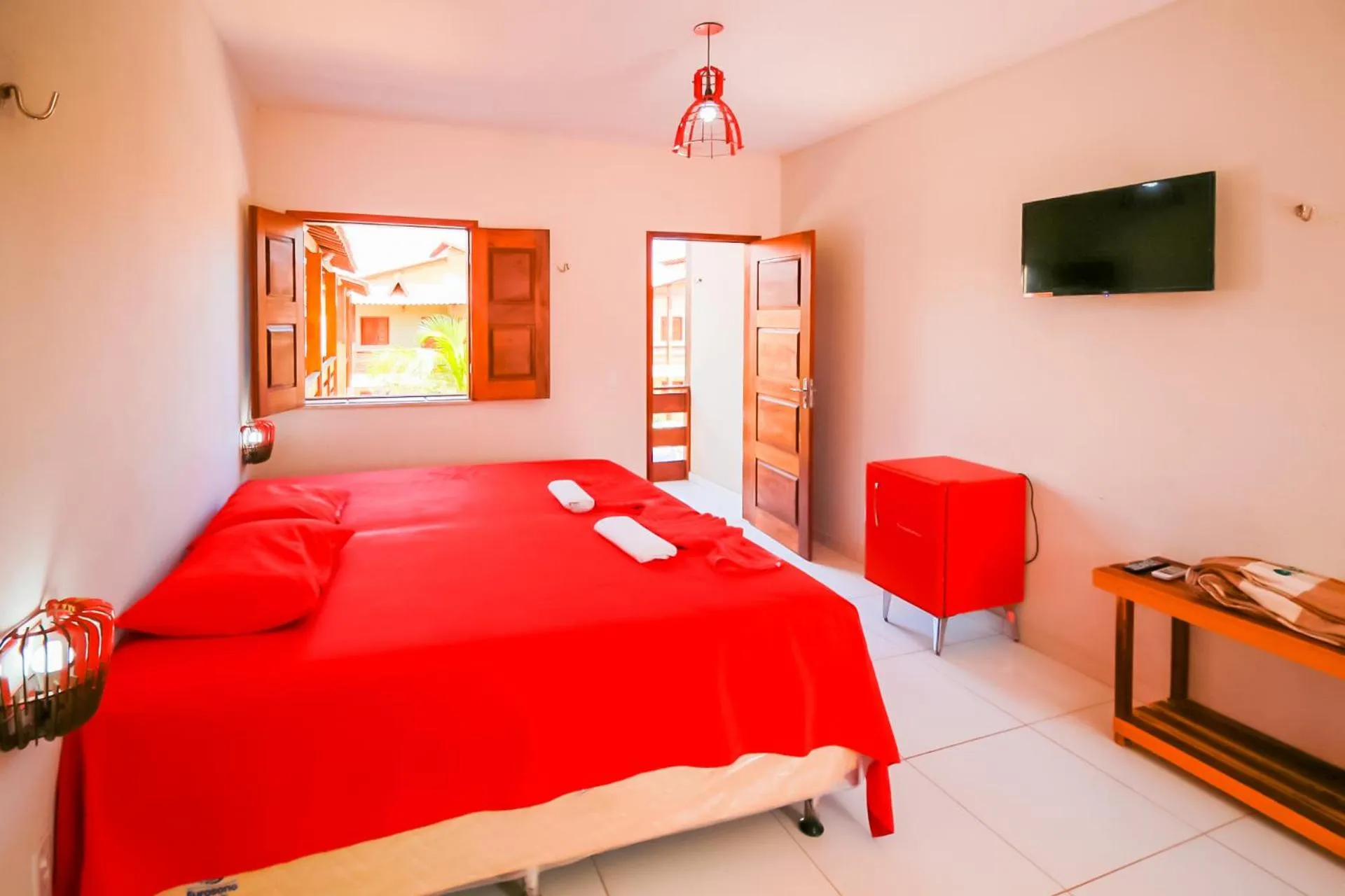 Bed in Pousada Recanto Beach