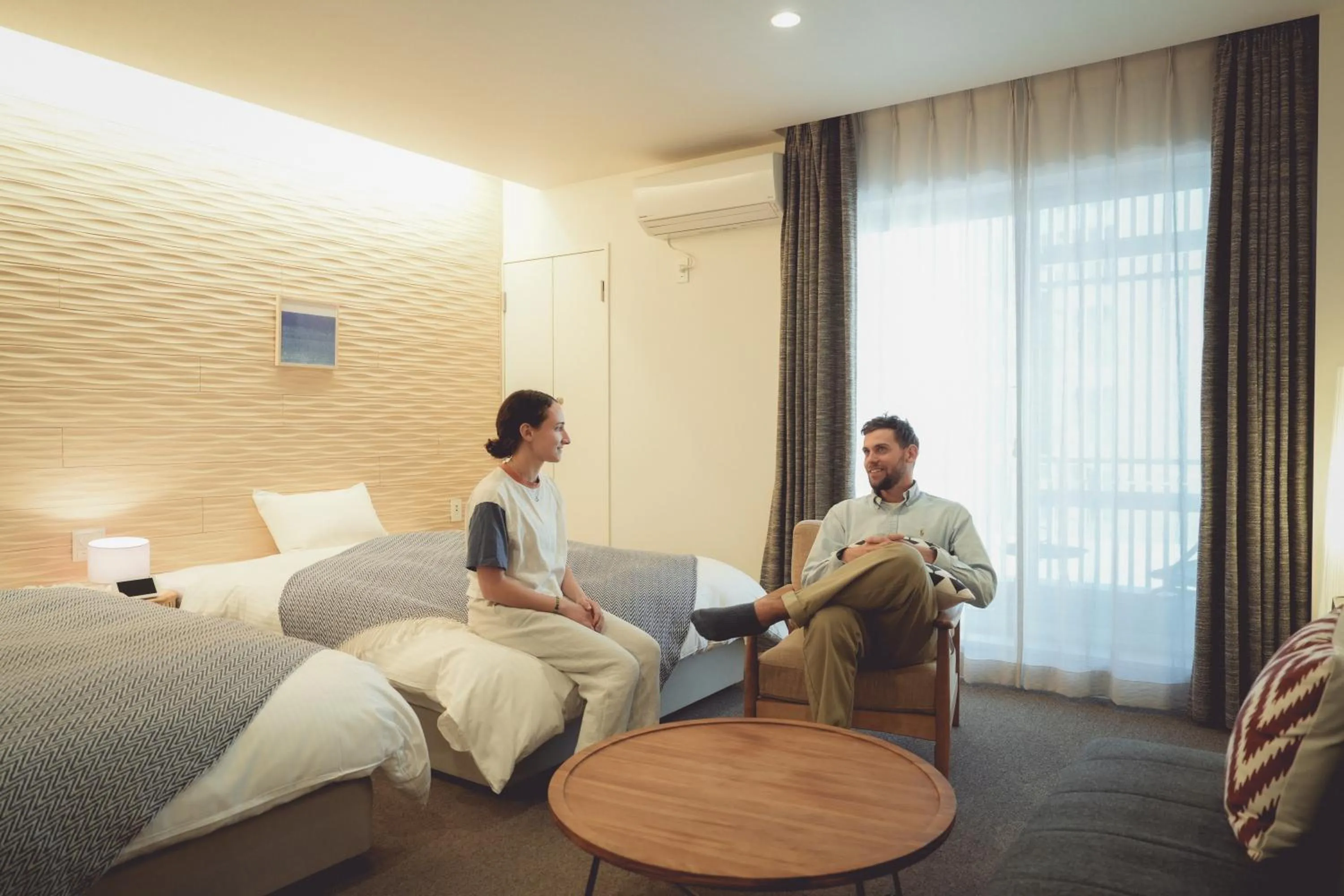 Living room, Bed in NAGI Hiroshima Hotel and Lounge