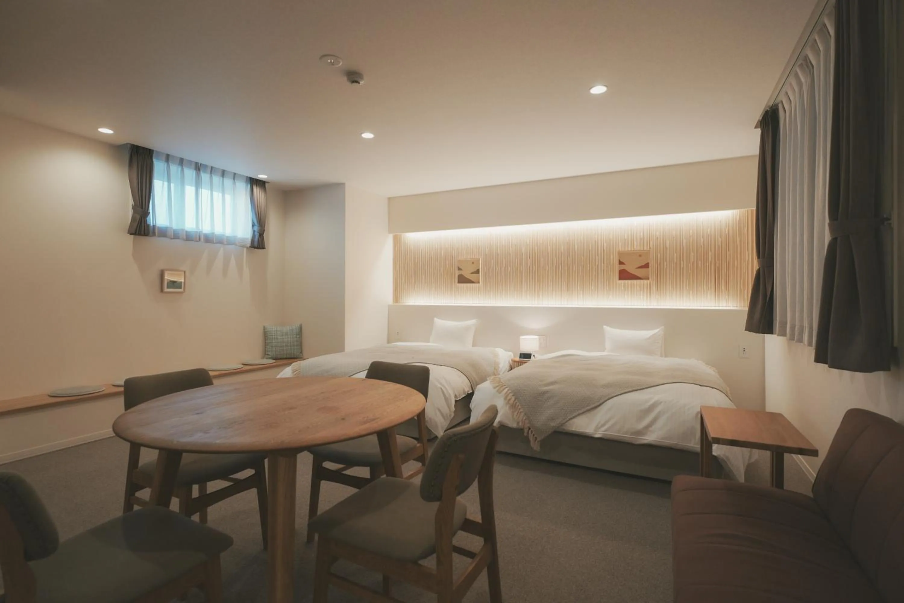 Photo of the whole room, Bed in NAGI Hiroshima Hotel and Lounge