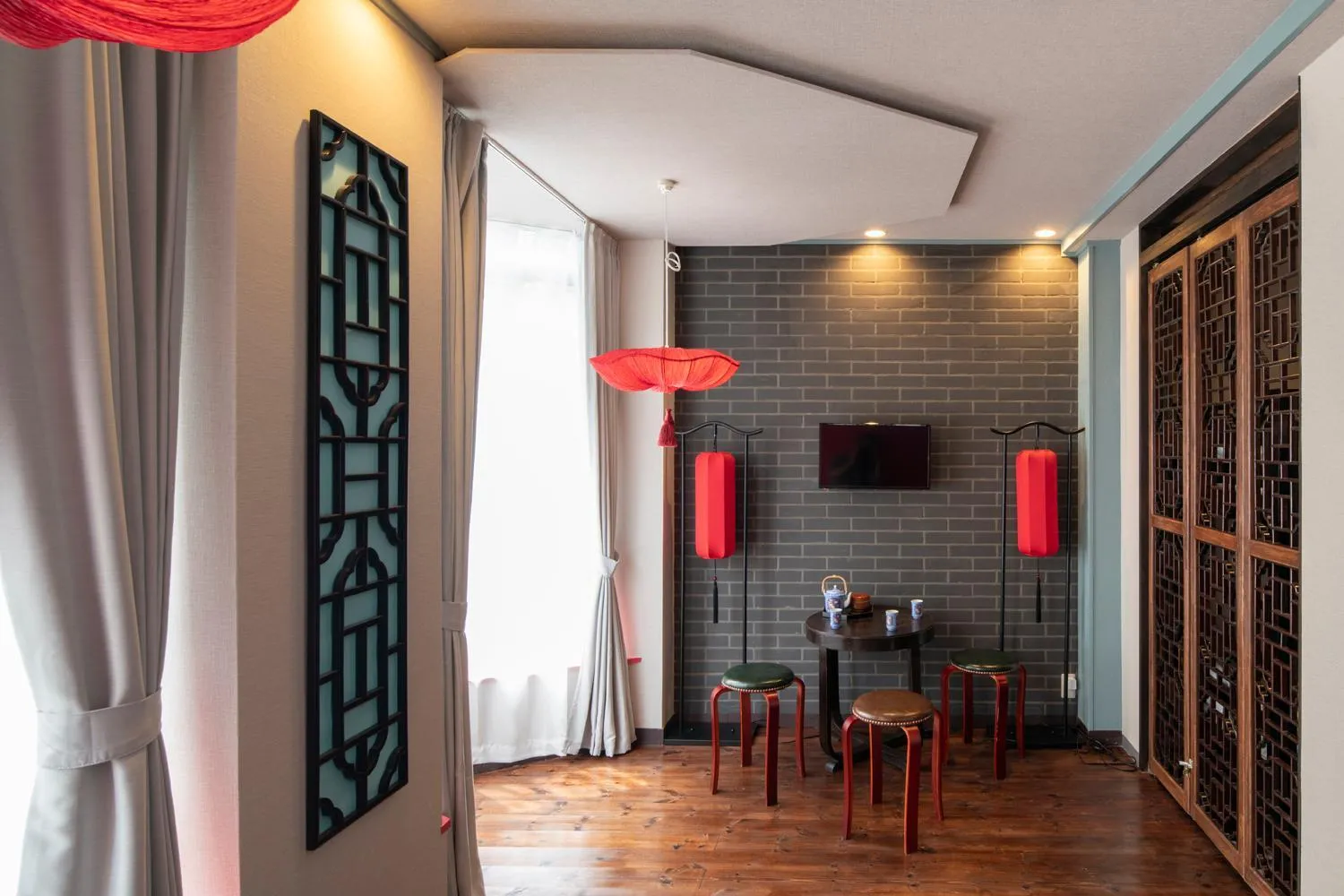 Communal lounge/ TV room in Room Inn Shanghai 横浜中華街 Room 2