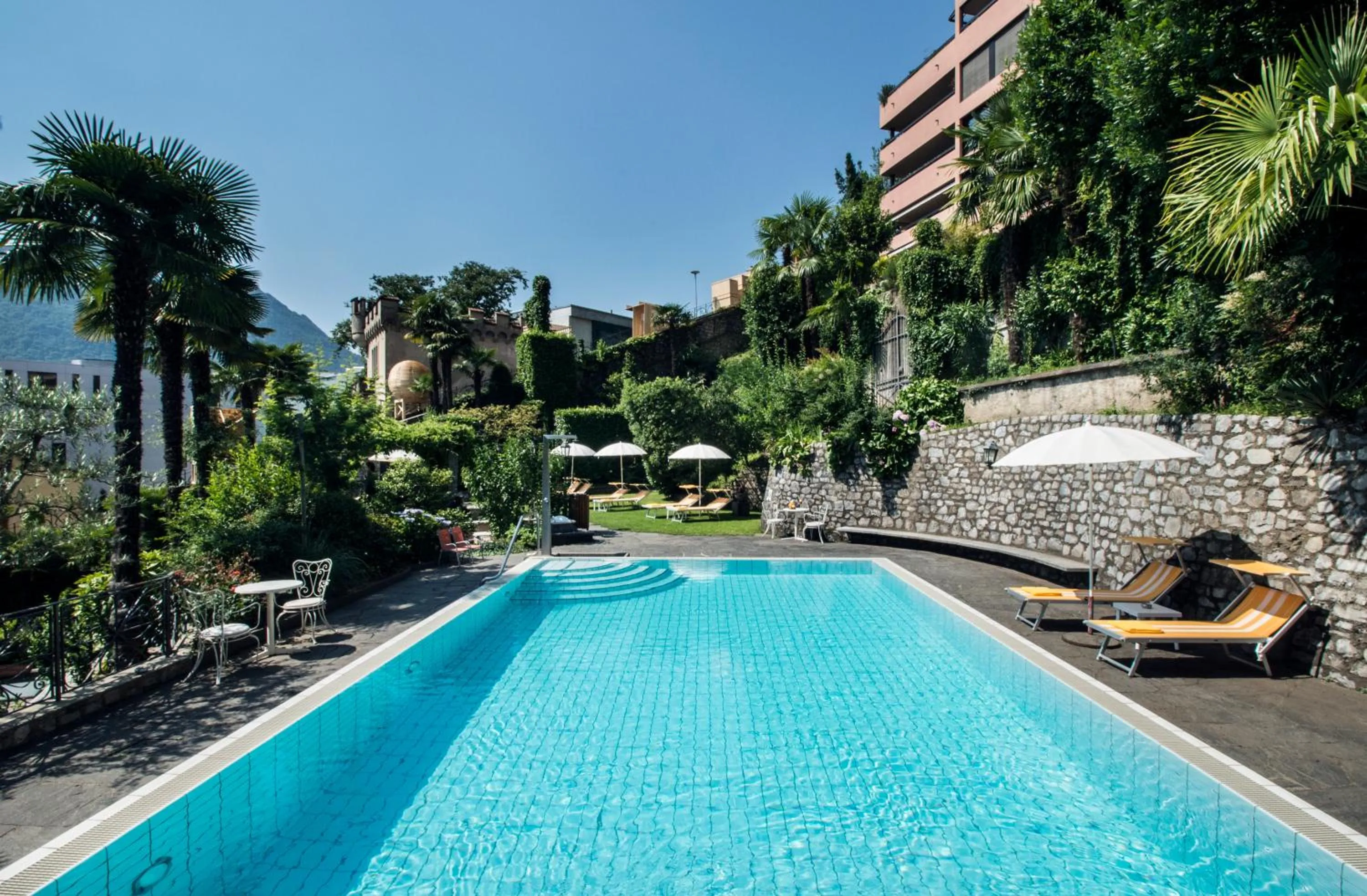 Garden in International au Lac Historic Lakeside Hotel