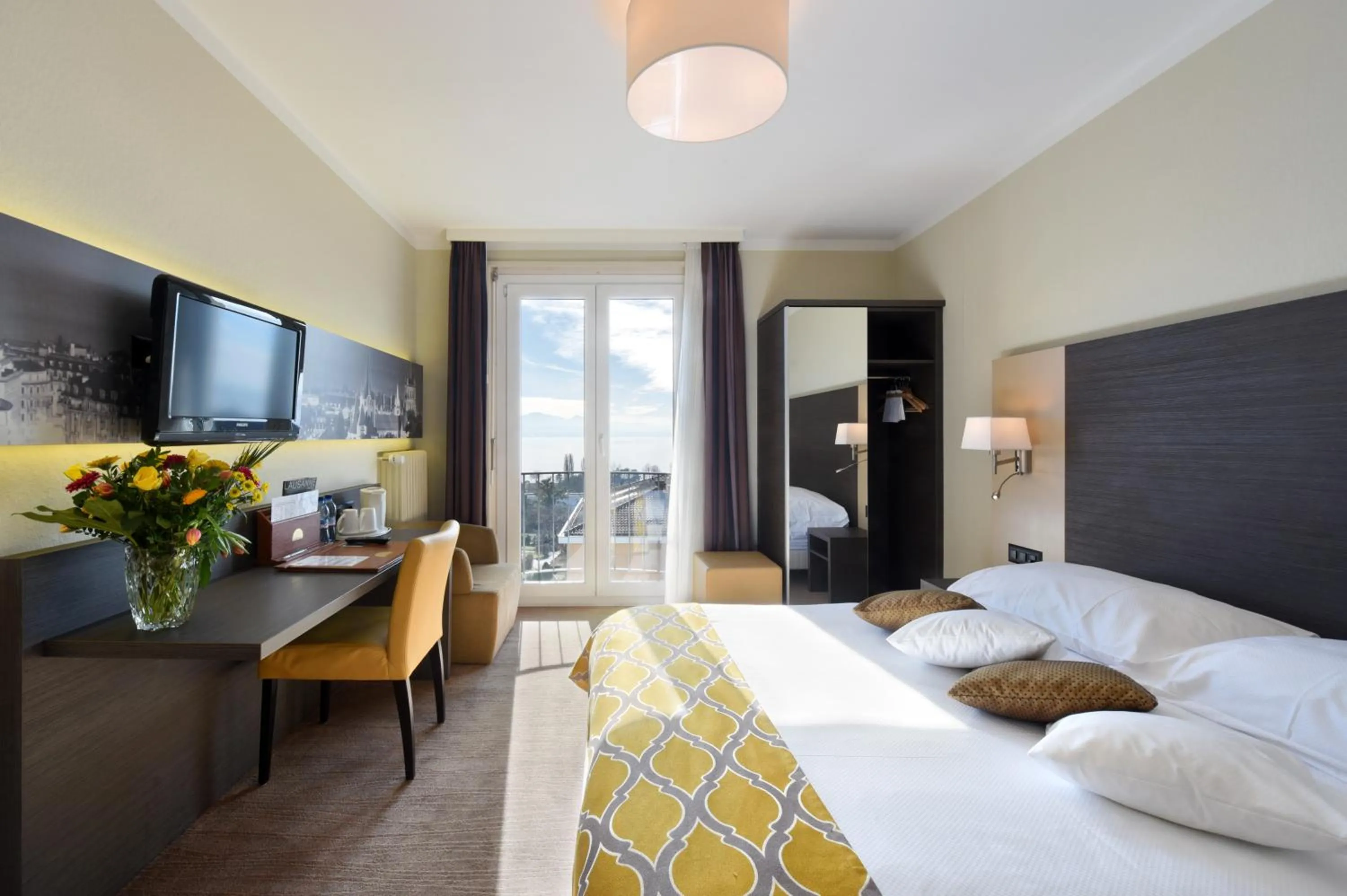 Photo of the whole room, Bed in Hôtel Bellerive