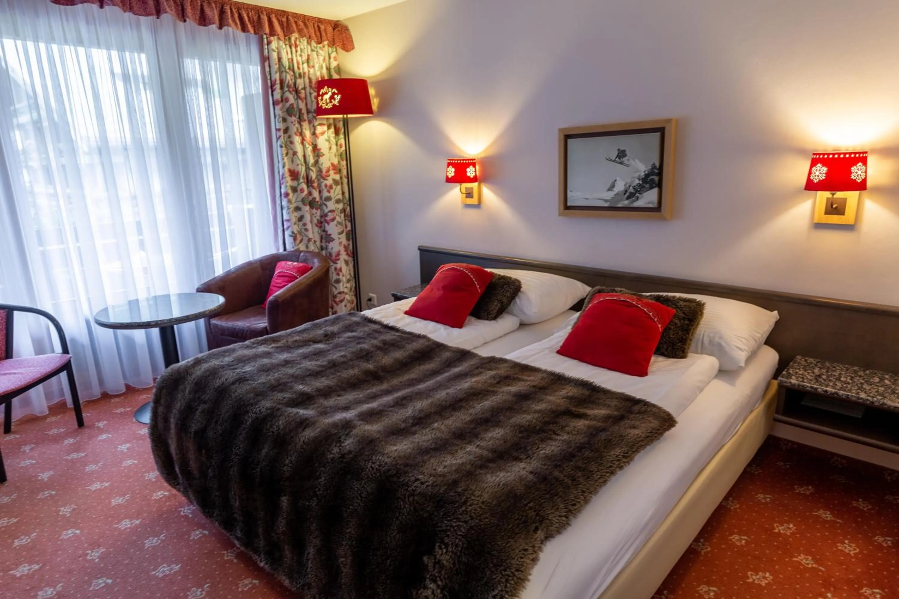 Bed in Chalet-Hotel Beau-Site