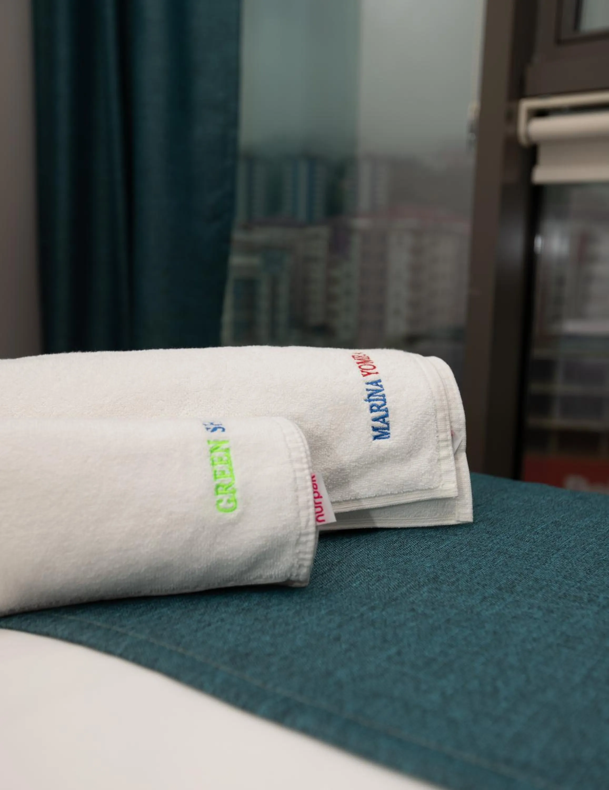 towels, Bed in Marina Green Suite & Residence