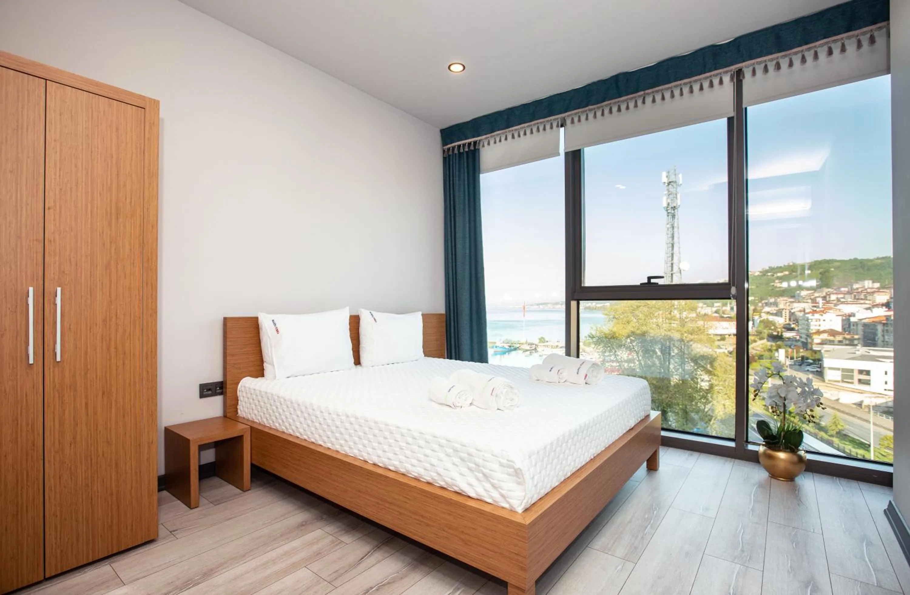 Bedroom, Bed in Marina Green Suite & Residence