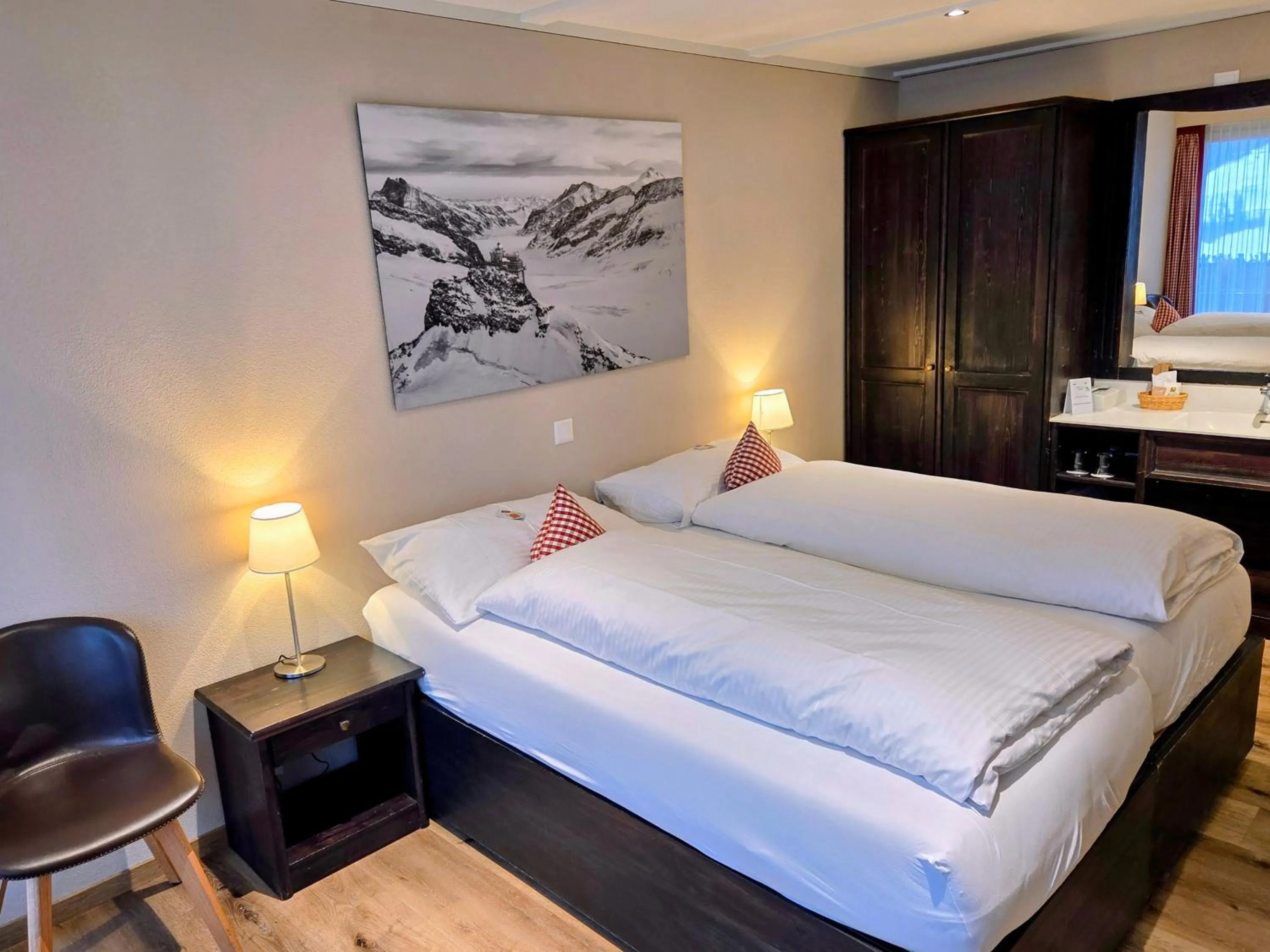 Photo of the whole room, Bed in Hotel Bernerhof Grindelwald