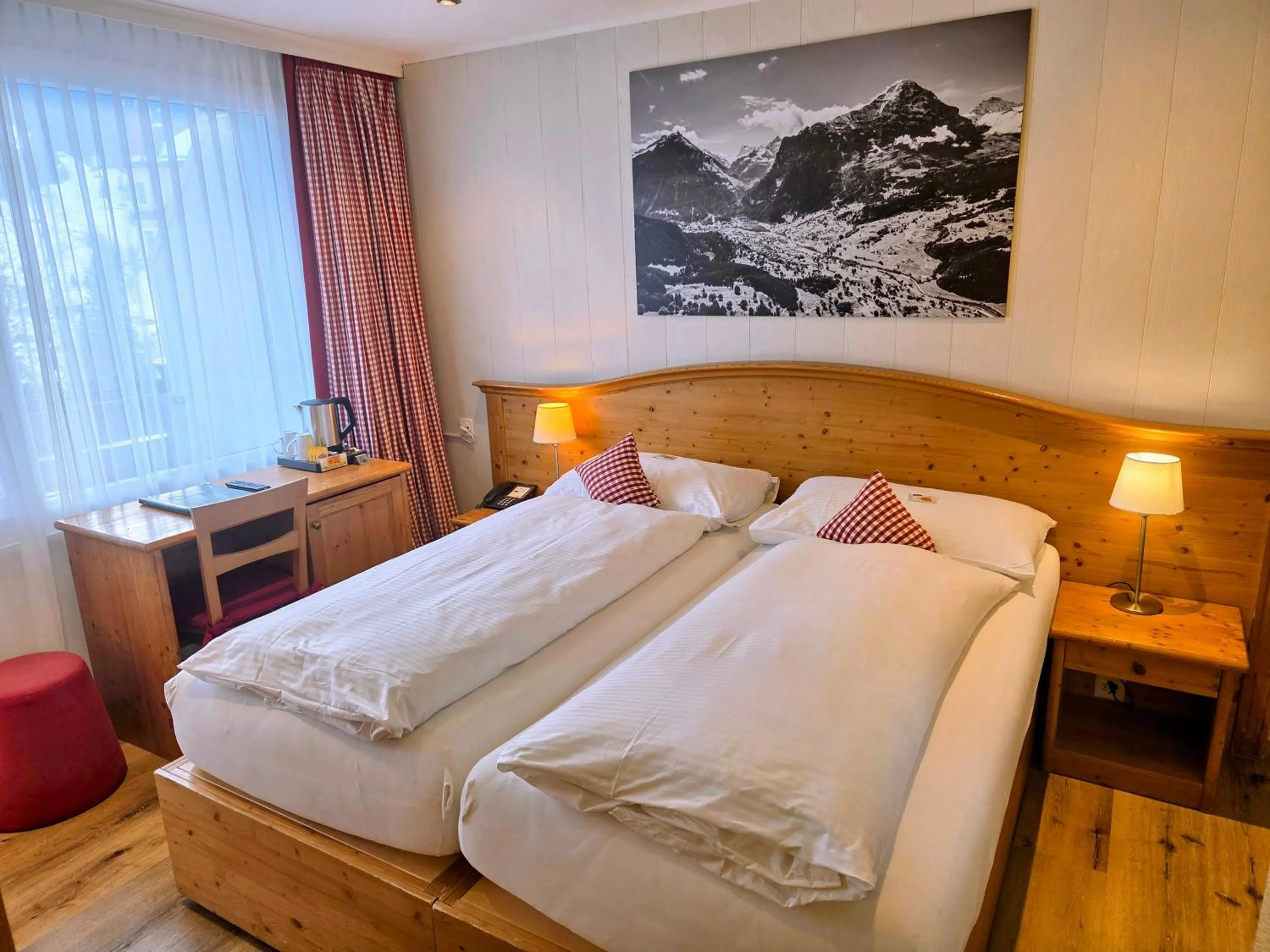 Photo of the whole room, Bed in Hotel Bernerhof Grindelwald