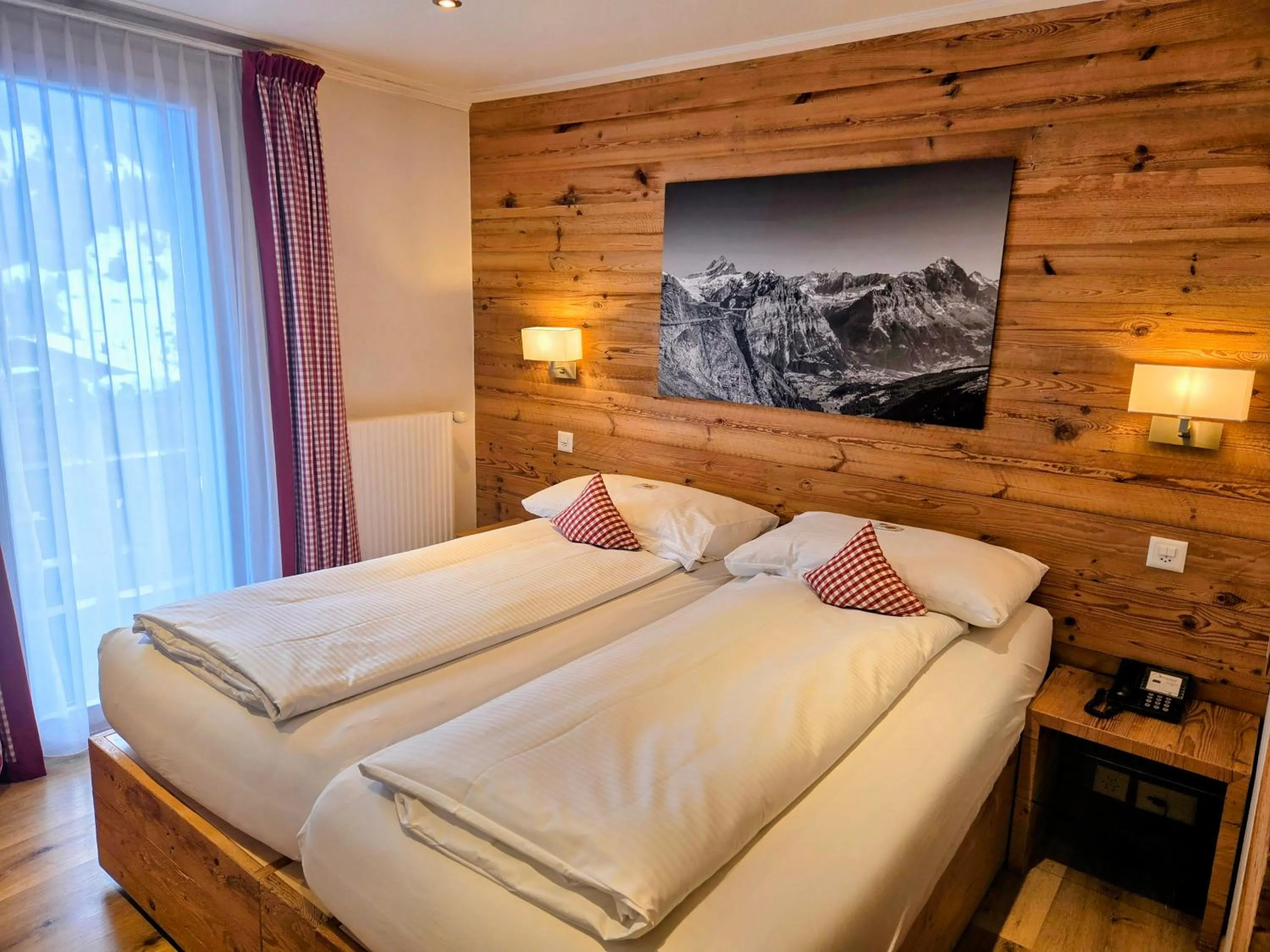 Photo of the whole room, Bed in Hotel Bernerhof Grindelwald