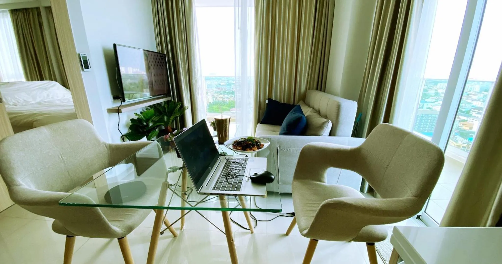 Living room in Rare Panoramic Sea, City & Mountain Views - XXL Balcony - 1Gbps Blazing Fast Free WIFI - Pool - Gym - Pool Table - Steam - Sauna - Bar