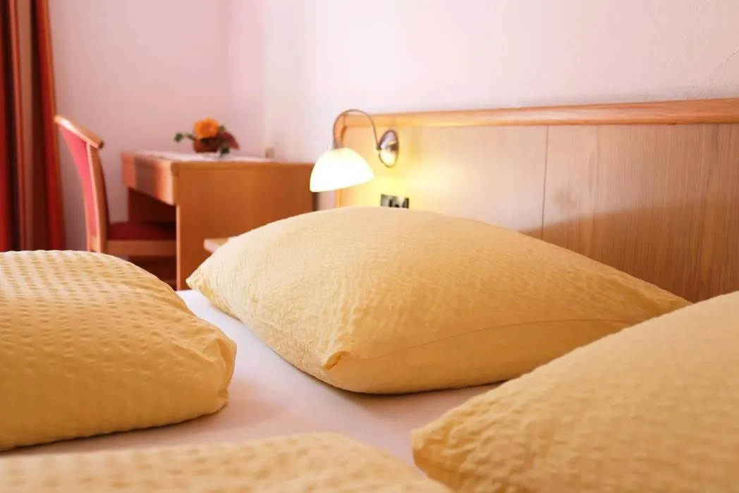 Bed in Gasthof Albergo Neuwirt