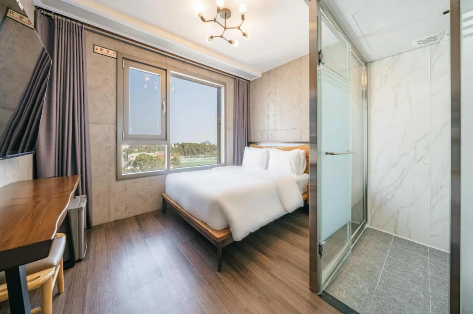 Bed in Cornerstone Hotel