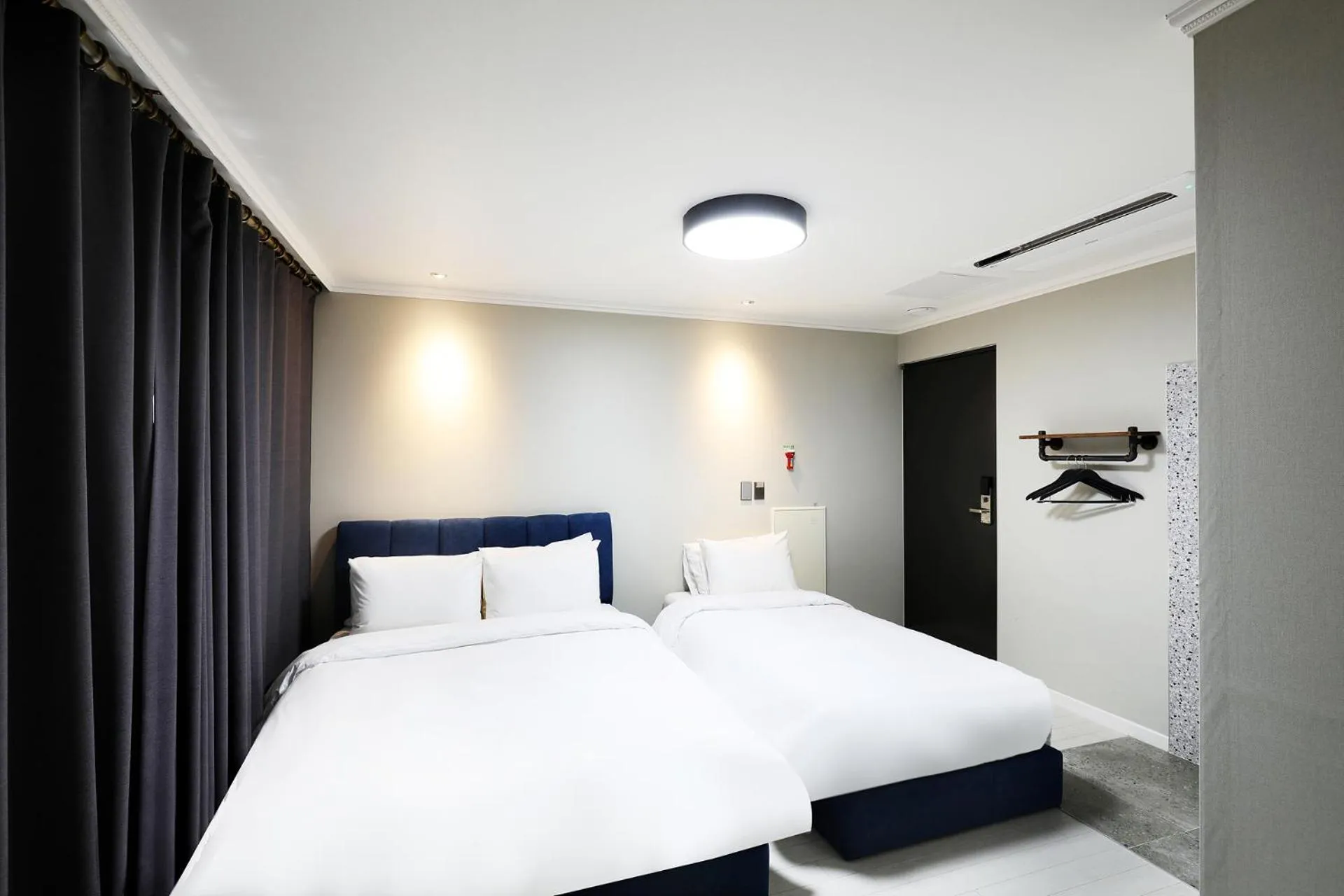 Bed in Cornerstone Hotel