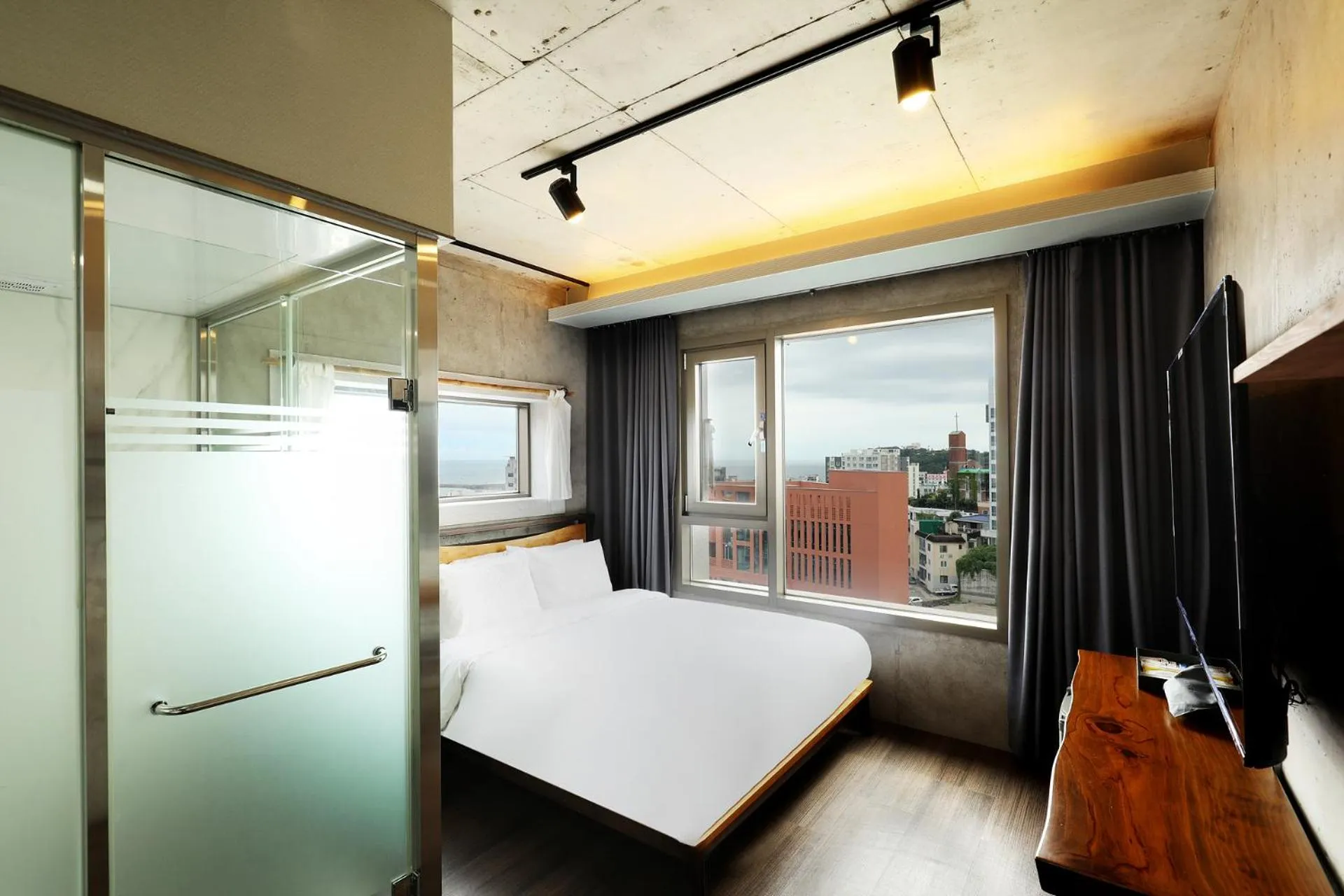 Bed in Cornerstone Hotel