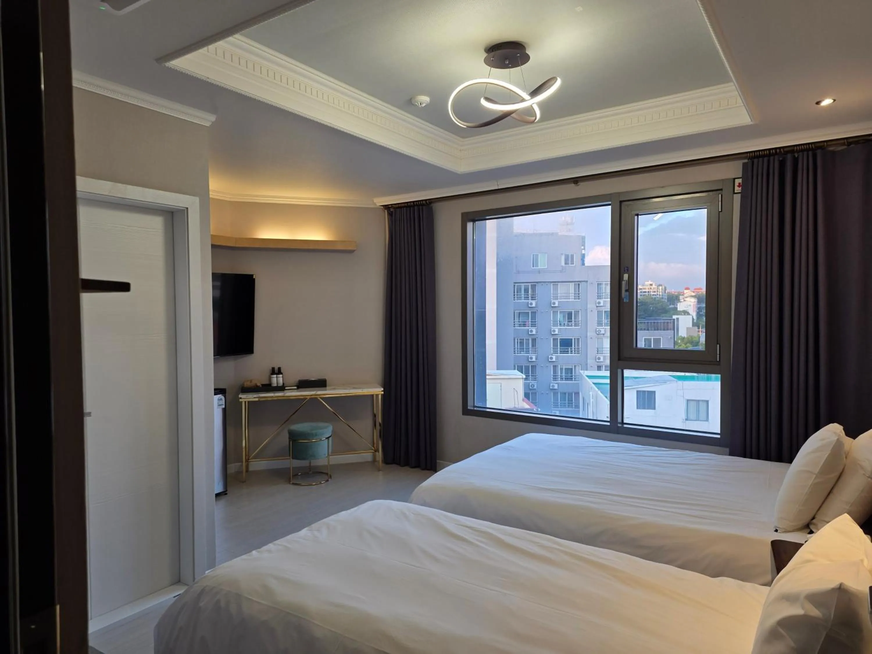 Bed in Cornerstone Hotel